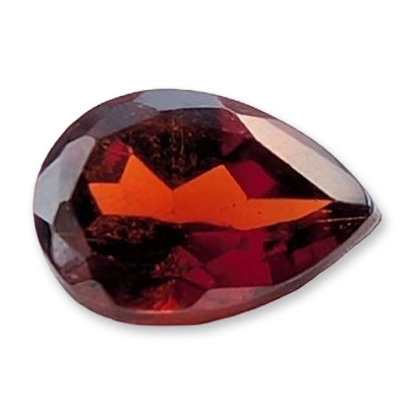 Pear-Cut Faceted Red Garnet Gemstone: Pear-cut faceted gemstone appearing to be a red garnet, featuring a deep orange-red to brownish-red color and internal dark crystal inclusions. Minor surface wear and facet junction abrasion visible.