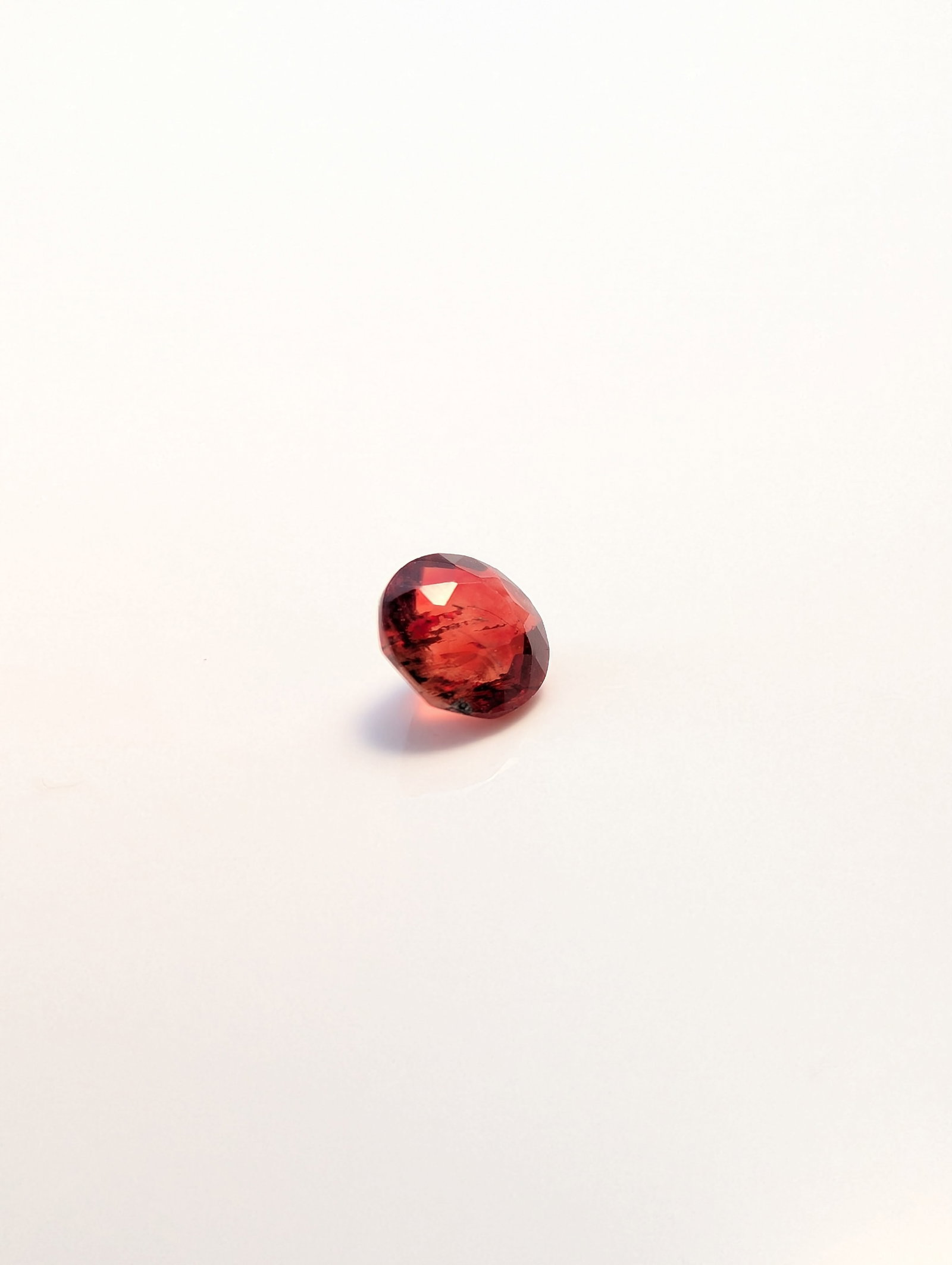 Faceted Round Orange-Red Gemstone - 3