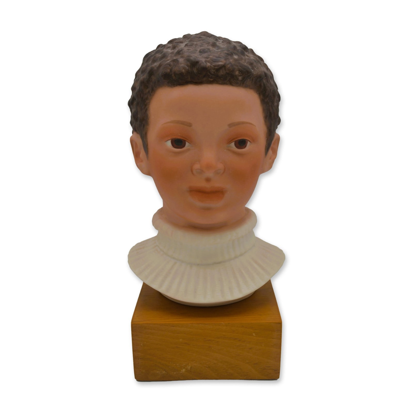Cybis Porcelain Jason, Child Bust On Wood Base, 1978: Bisque Porcelain Decorated, hand created, hand painted by the Artisans of the Cybis Studios in Trenton, NJ, USA. Featuring the Sculpture of Jason, the Child Head Bust from The Children of the World Co