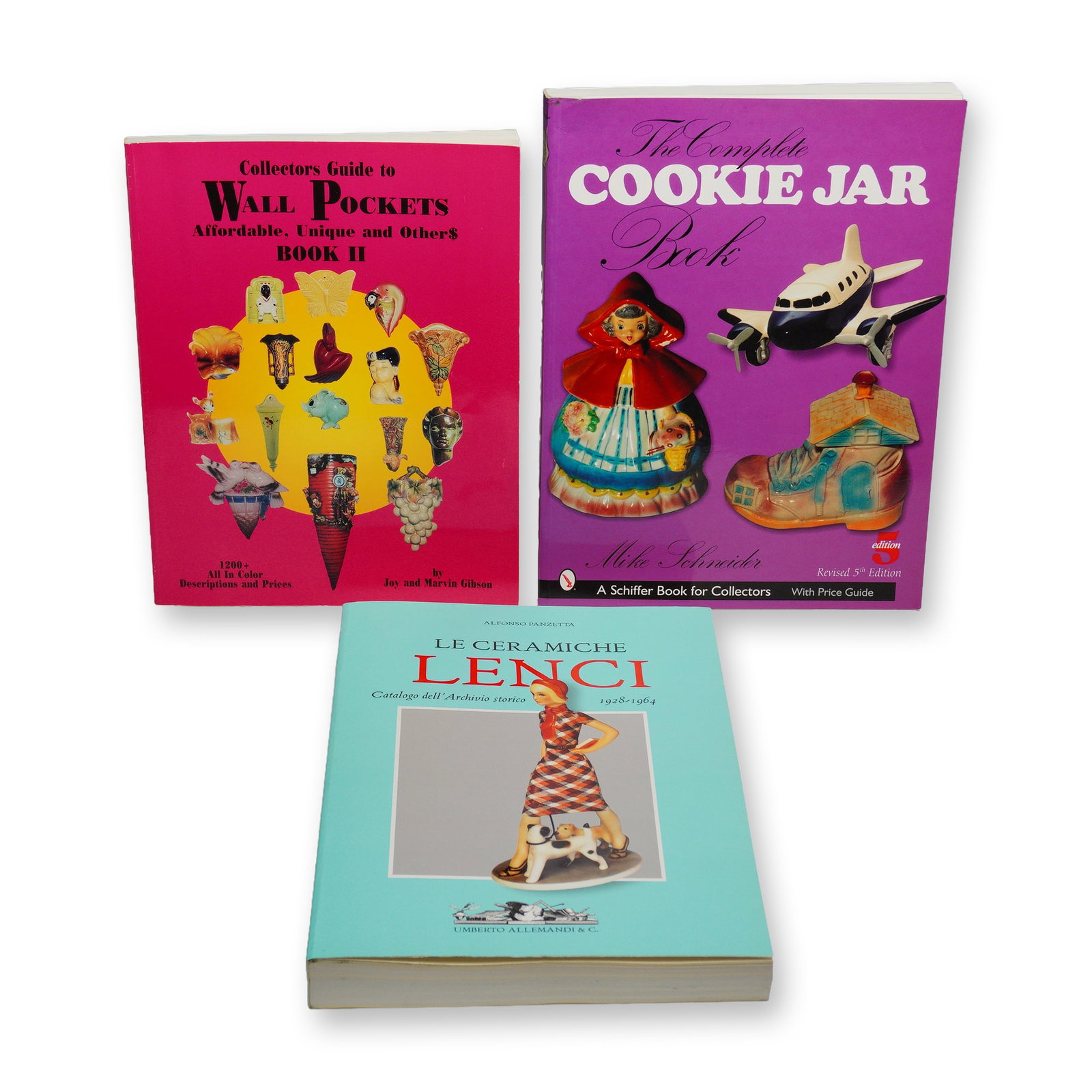 Three Collectible Ceramics Softcover Reference Books 1997-2005: This lot consists of three collectible ceramics books, featuring a mix of hardcover and trade paperbacks books. The collection includes the Collectors Guide to Wall Pockets: Affordable, Unique and Oth