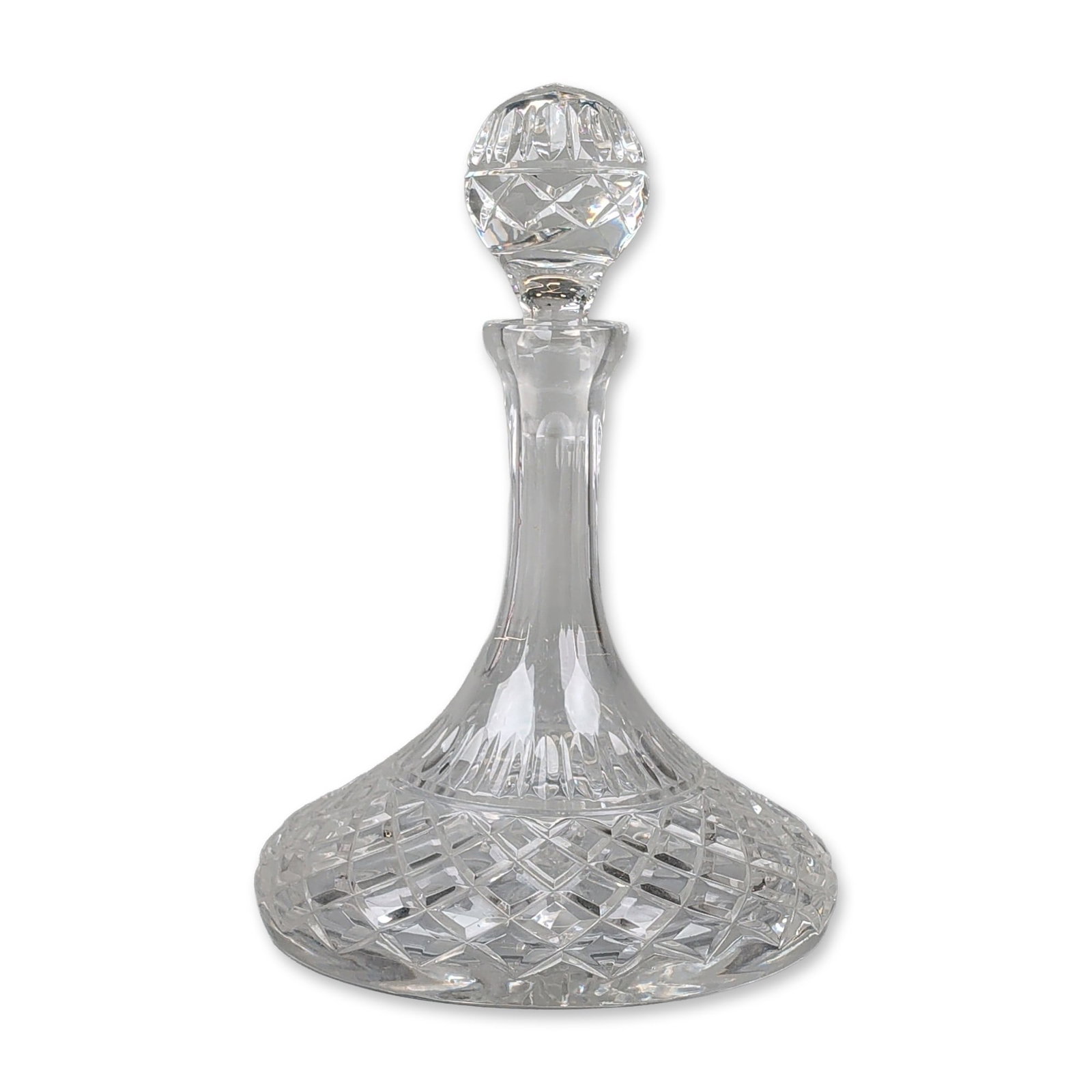 Cut Crystal Ship Decanter with Stopper: Cut lead crystal ship decanter with a matching spherical stopper. The vessel features a wide, low-profile base decorated with a band of diamond-cut cross-hatching below a ring of vertical mitre cuts