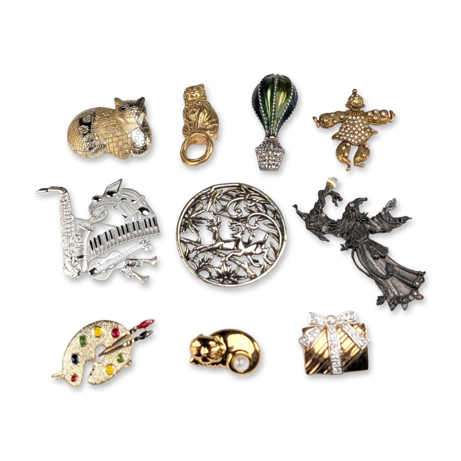 10pc Group of Vintage Costume Jewelry Brooches: An assortment of ten vintage costume jewelry brooches in various figural and thematic motifs. The collection includes a large gold-tone cat with a textured body, bearing a recessed rectangular cartouc
