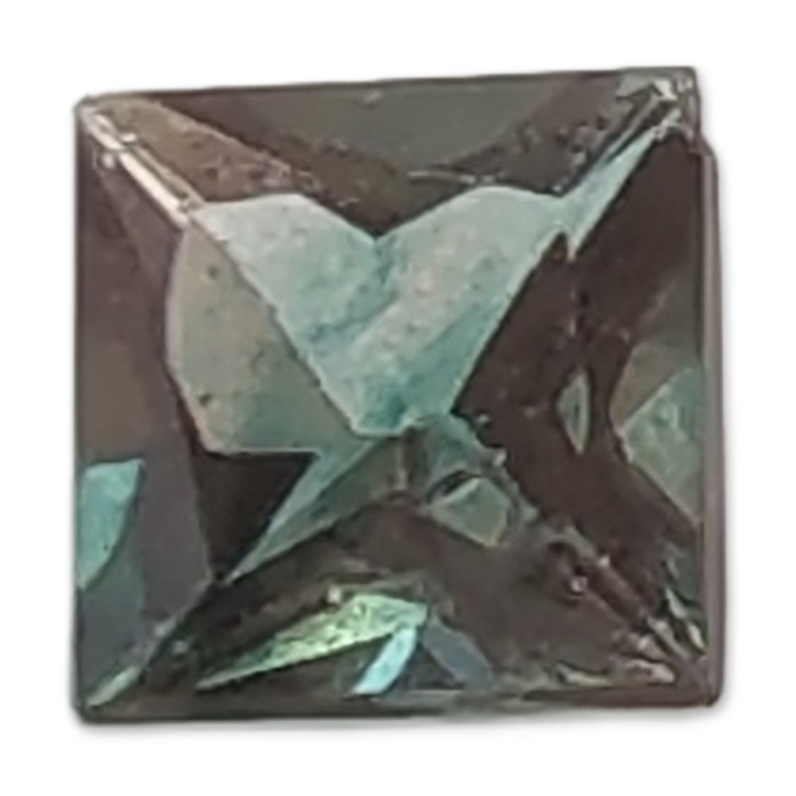 Square Modified Brilliant Cut Color Change Stone: Loose stone in a square modified brilliant cut. The stone exhibits a distinct color-change effect shifting from teal-green to reddish-purple under varying light sources. The cut features a high crown 