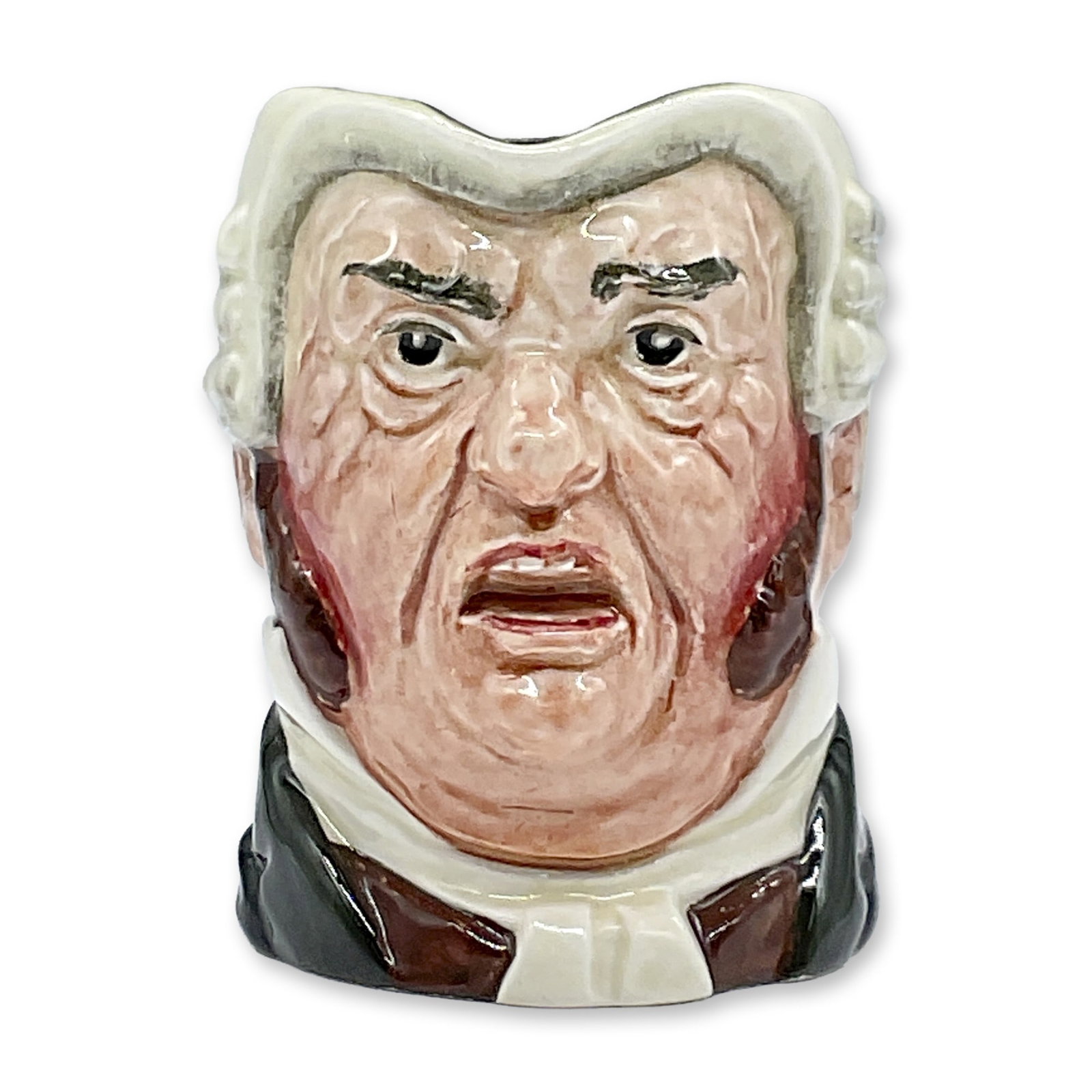 Royal Doulton Small Character Jug, Buz Fuz D5838: This glossy character jug features a white collar, brown waistcoat, dark green coat and black robe. Royal Doulton Backstamp. Dimensions: 3.75"L x 2.5"W x 3.25"H Date or Era: 1948 - 1960 Manufacturer o