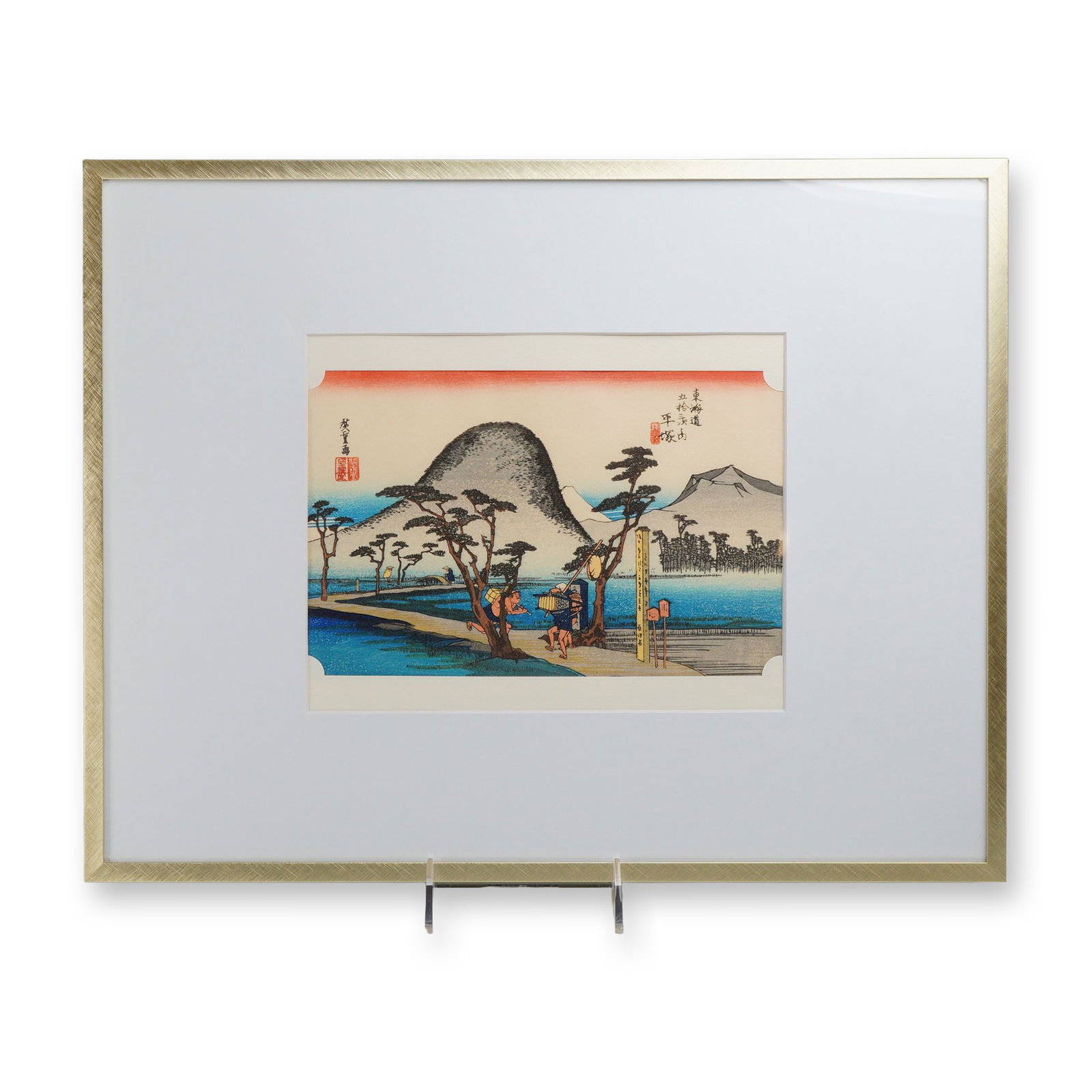 After Utagawa Hiroshige, Nawate Road, Japanese Woodblock Print on Laid Paper: A polychrome woodblock print (nishiki-e) on laid paper, a modern reprint after the original design by Utagawa Hiroshige (1797-1858), titled Hiratsuka: Nawate Road from The Fifty-three Stations of the 