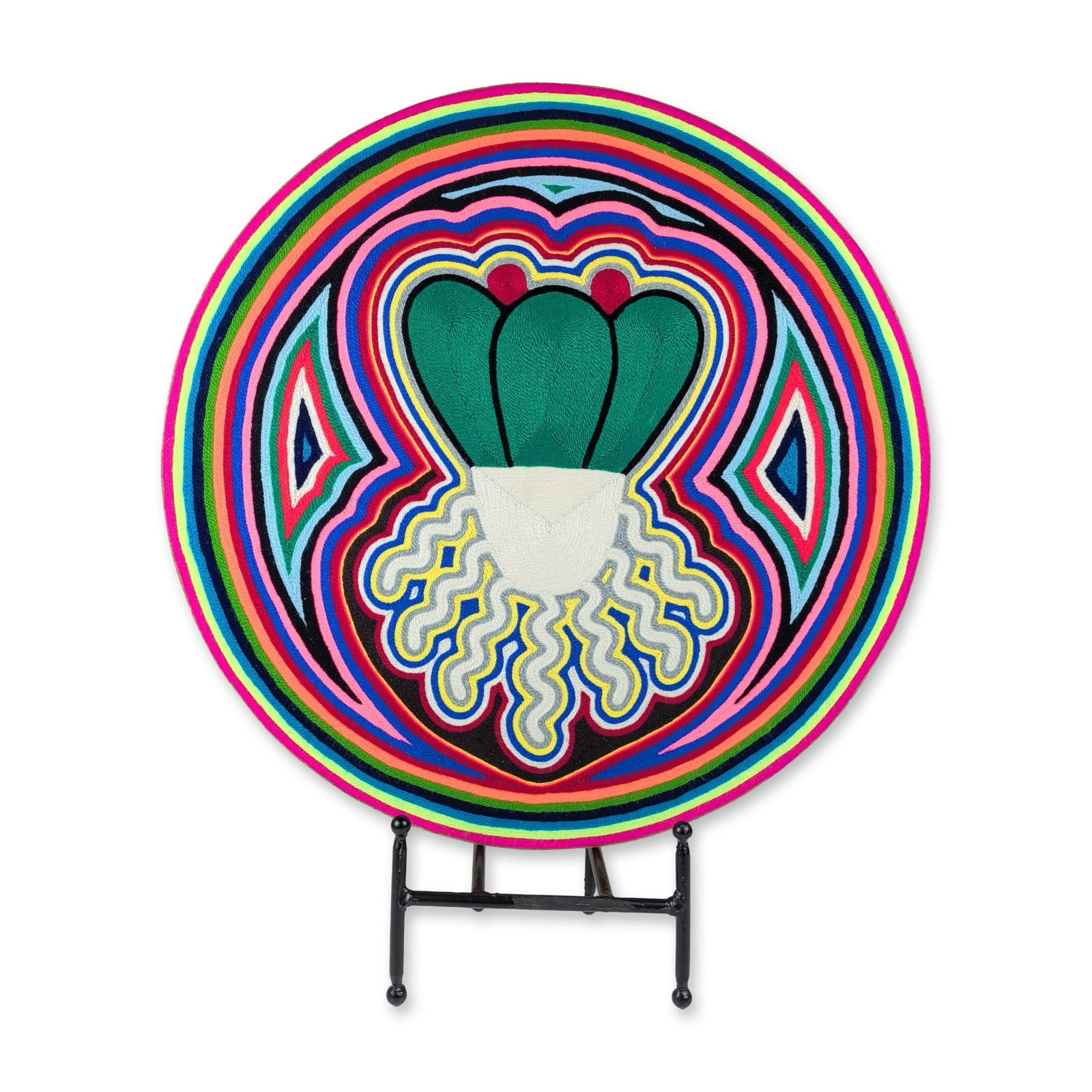 Huichol Mexican Folk Art Circular Peyote Nierika Yarn Painting: Mexican folk art yarn painting in tondo format, executed on a circular wood panel with commercial yarn pressed into a wax-and-resin adhesive layer. The central composition depicts stylized off-white r