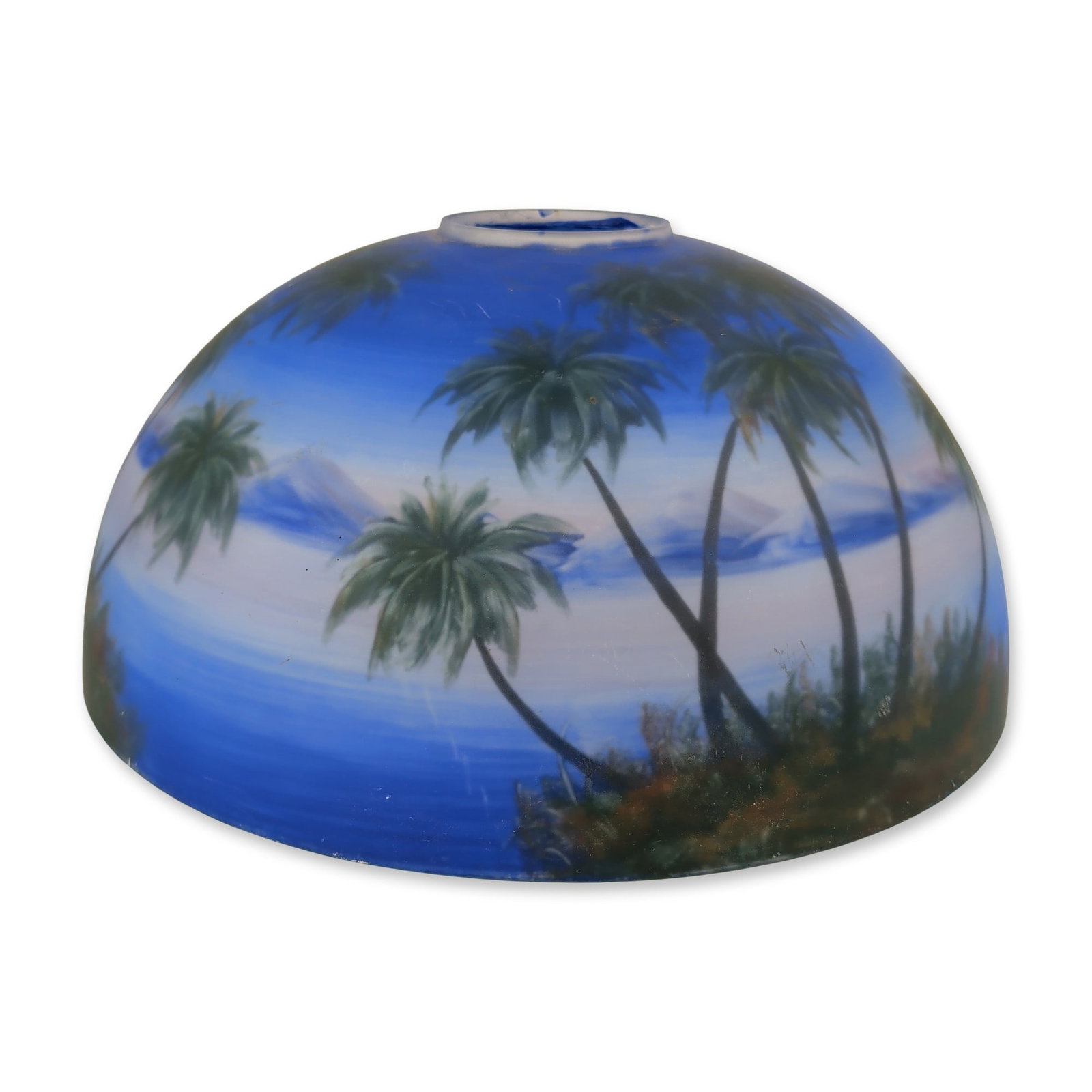 Large Tropical Reverse Painted Glass Lampshade: Large hemispherical glass lampshade featuring a reverse-painted tropical landscape on the interior surface. The panoramic decoration displays palm trees with dark trunks and feathered fronds against a