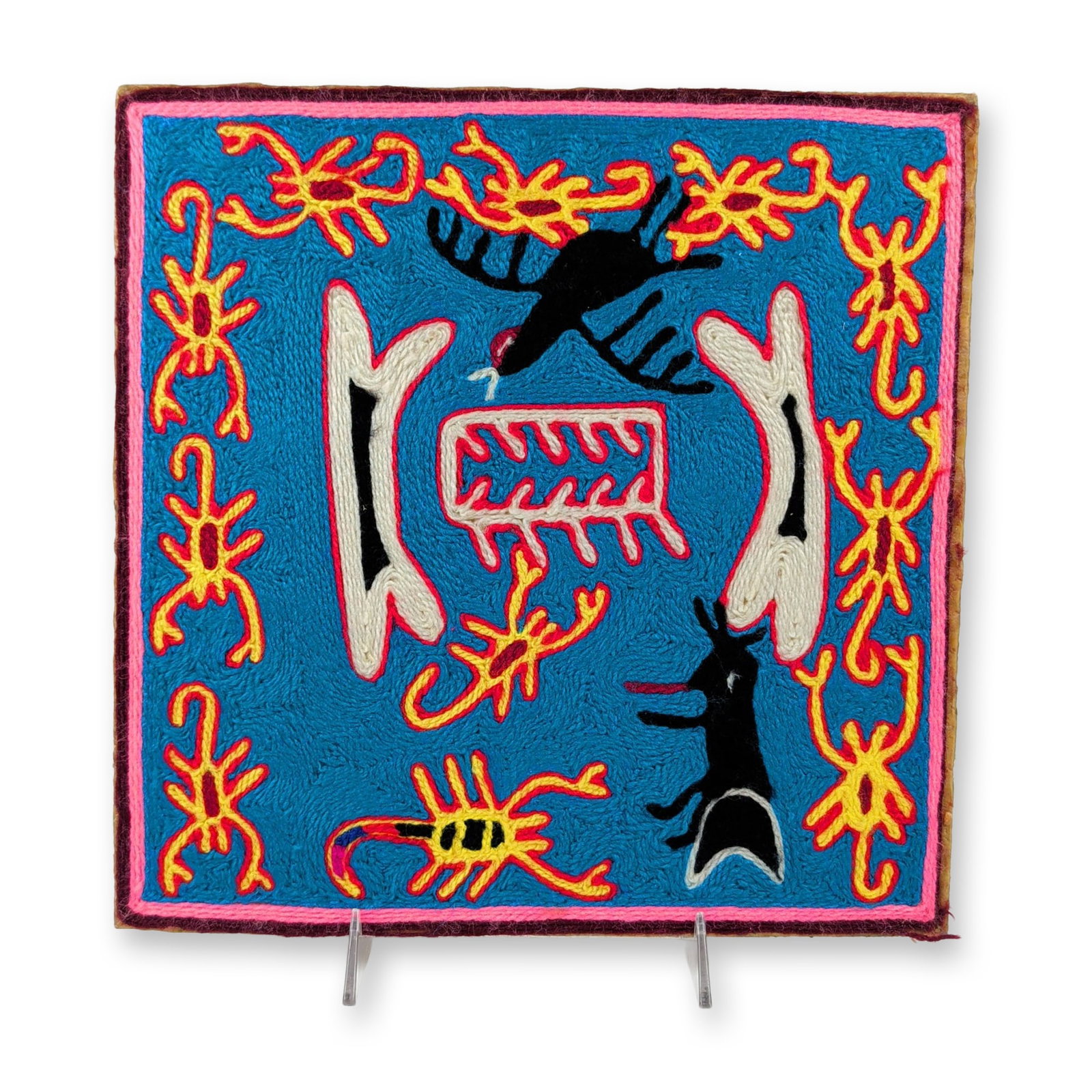 Huichol Mexican Folk Art Parikute & The Scorpion Myth Nierika Yarn Painting: This square Mexican Huichol yarn painting is hand-crafted with vibrant commercial yarn pressed into a beeswax and resin layer on a hardboard backing, designated as piece number 20. The complex narrati
