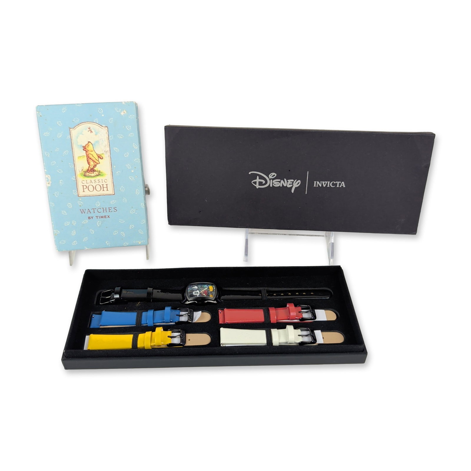 2pc Invicta Disney Limited Edition and Timex Classic Pooh Watch Set: This delightful horological collection features two distinctive Disney character watches presented in their original custom packaging. The lot is highlighted by a limited edition Invicta model 25895 s