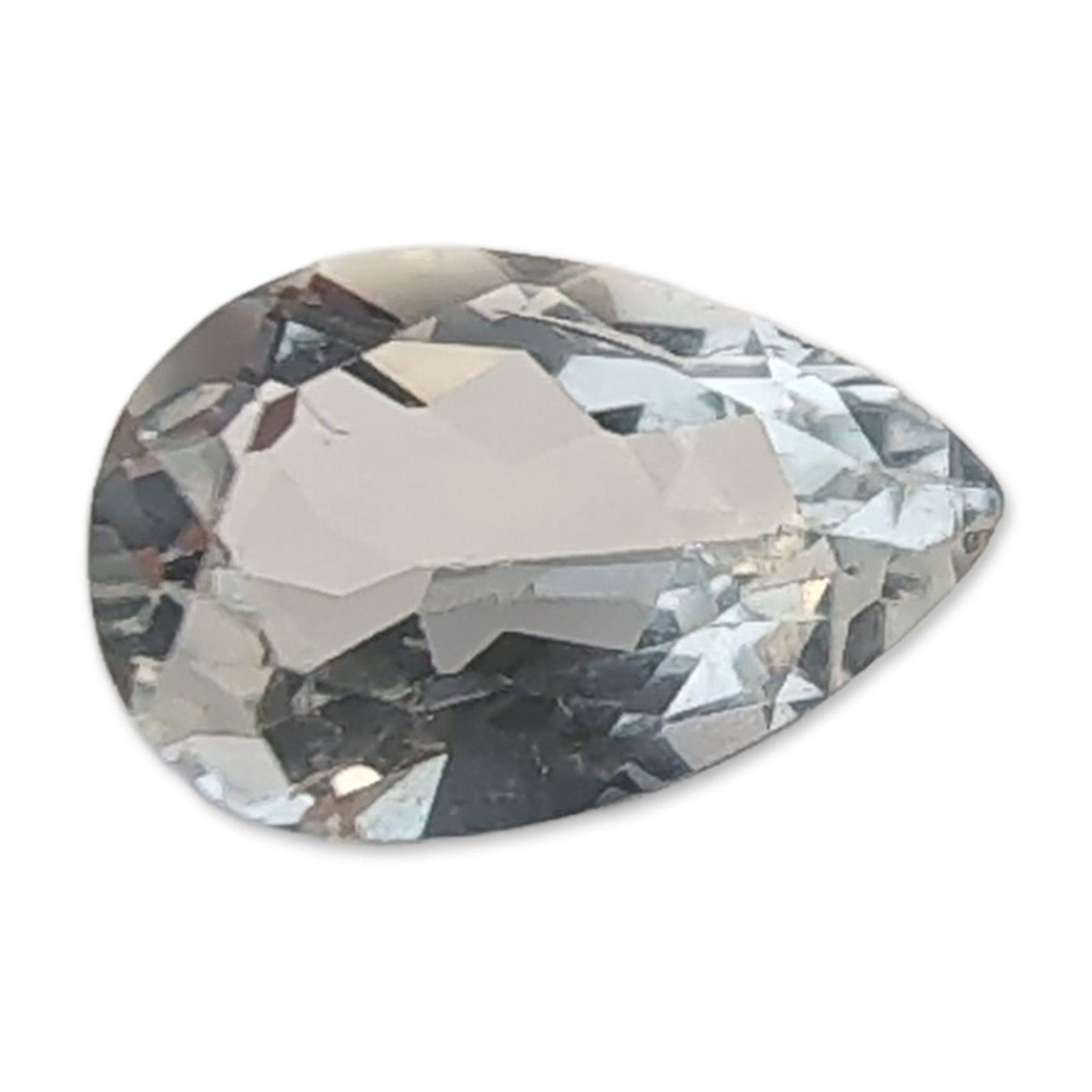 Pear Cut Colorless Faceted Quartz Gemstone: A faceted colorless quartz gemstone, featuring a pear-shaped brilliant cut with a defined point and rounded base. The stone exhibits high transparency and eye-clean internal clarity. Facet junctions