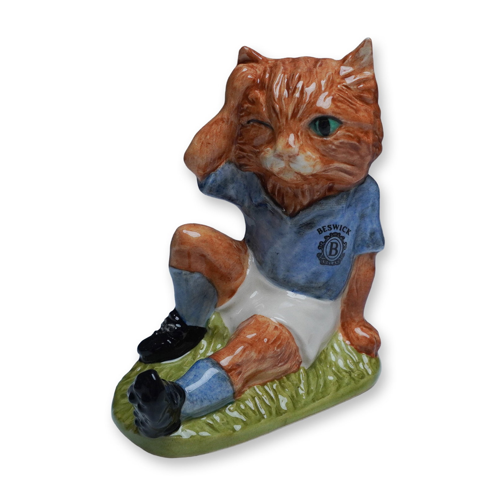 John Beswick Mee-Ouch Footballing Felines Figurine, Ltd. Ed.: From the Footballing Felines collection, this charming Mee-Ouch figurine (FF2) depicts a ginger cat in a blue football jersey, playfully holding its head in misfortune. A 1998 limited edition of 1,500