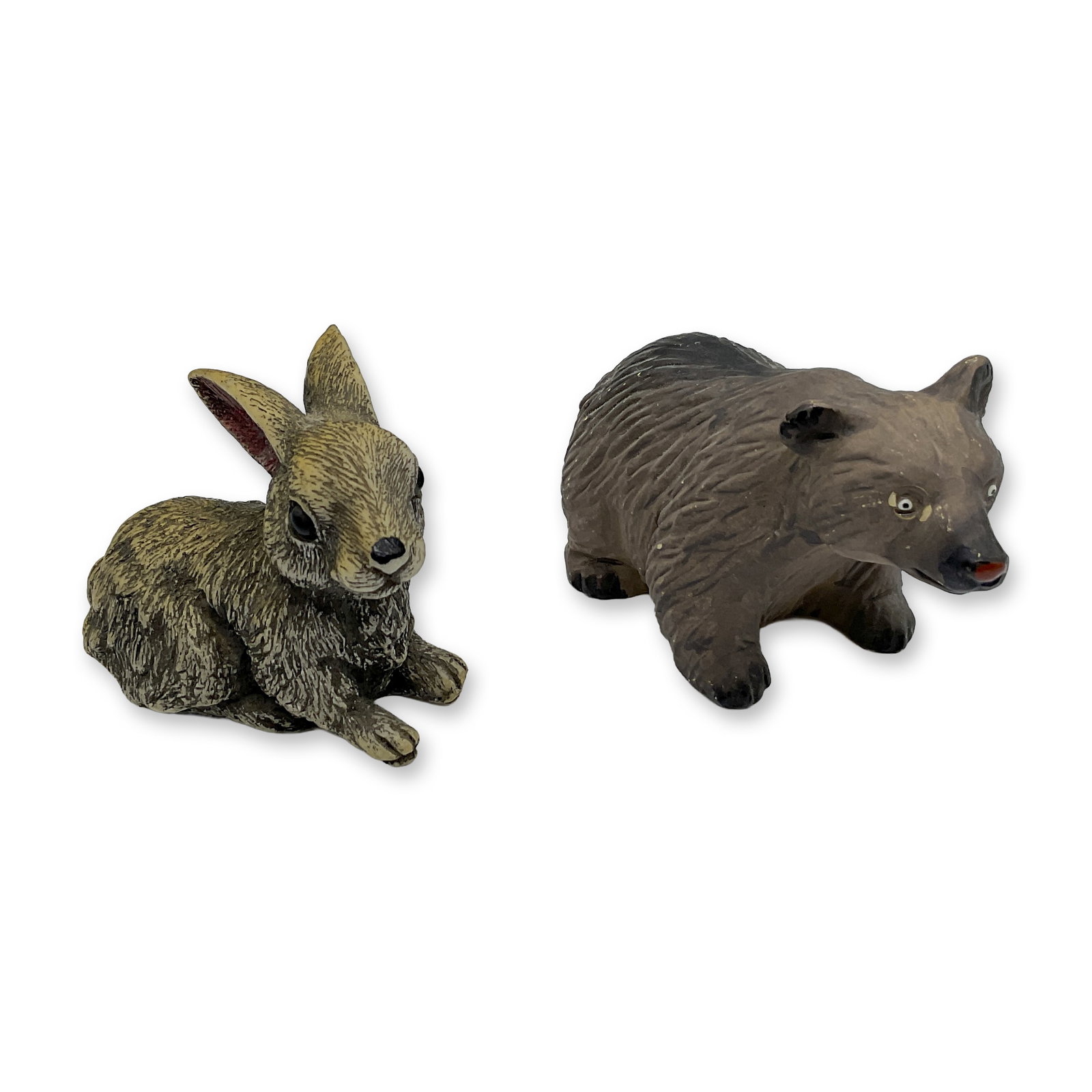 2pc Vintage Ceramic and Resin Animal Figurines: A collection of naturalistic wild creatures, such as a caramel-colored rabbit and a light brown bear. Rabbit: resin, 3"L x 2"W x 2.25"H. Bear: pottery, 4"L x 2"W x 2.5"H. Dimensions: See Description