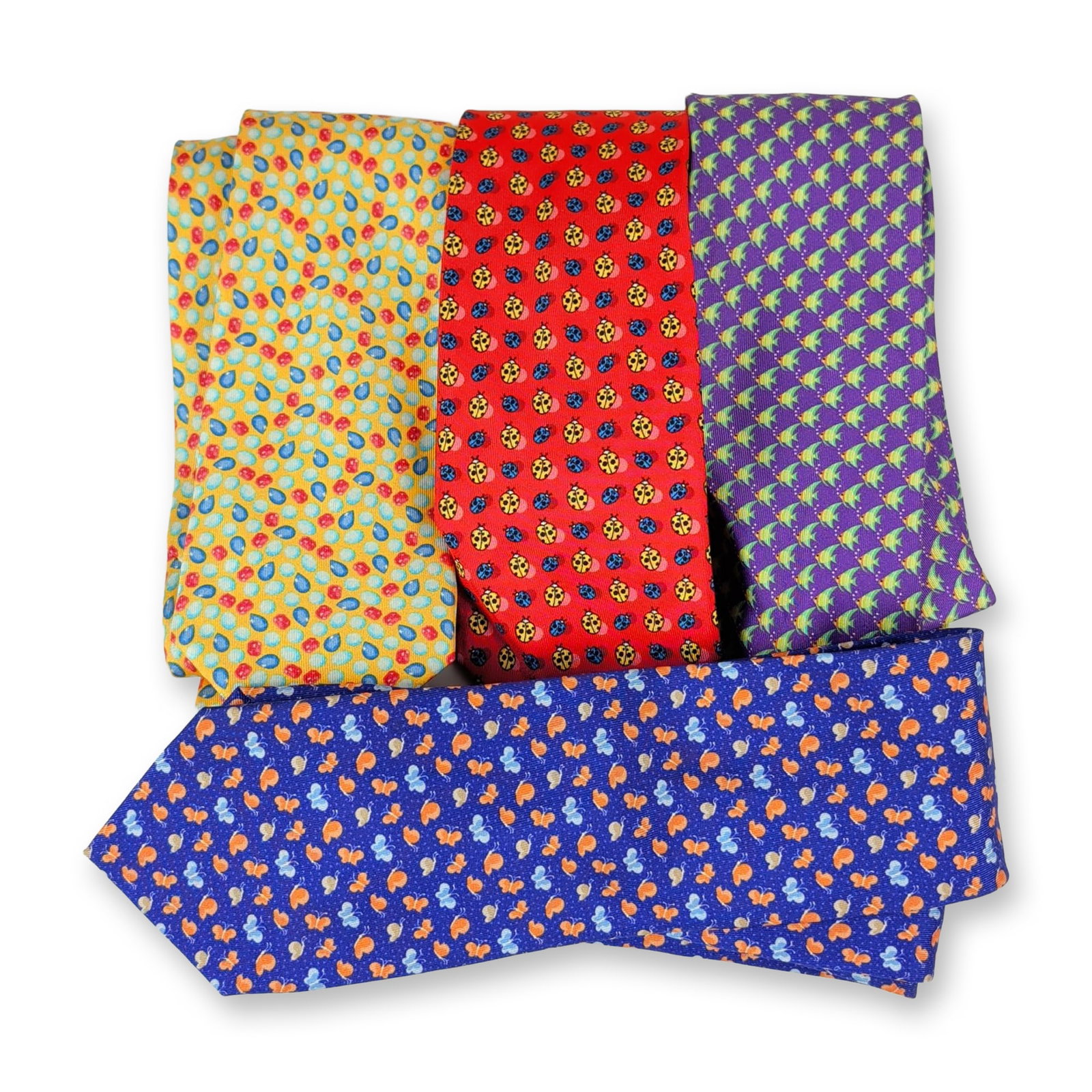 4pc Battistoni Roma Silk Neckties: This four-piece collection of premium Italian neckties is crafted from 100% silk by Battistoni Roma. The assortment features varied novelty and geometric patterns including repeating motifs of flying