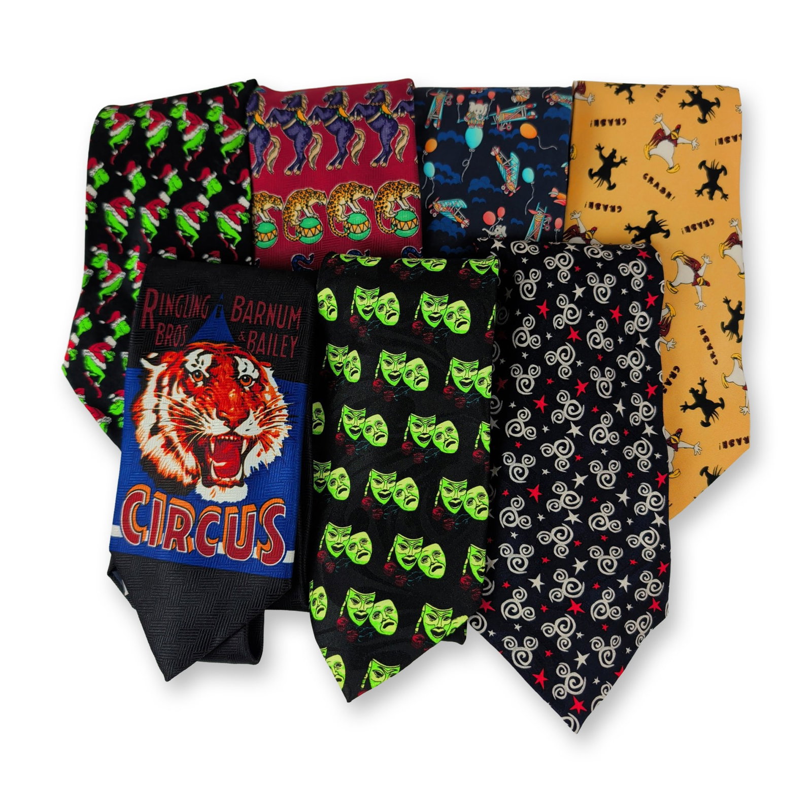 7pc Men's Novelty Character Neckties: Collection of men's novelty neckties featuring pop culture, theatrical, and circus-related motifs. Designs include the Grinch with a printed literary quote, comedy masks, and Ringling Bros. and