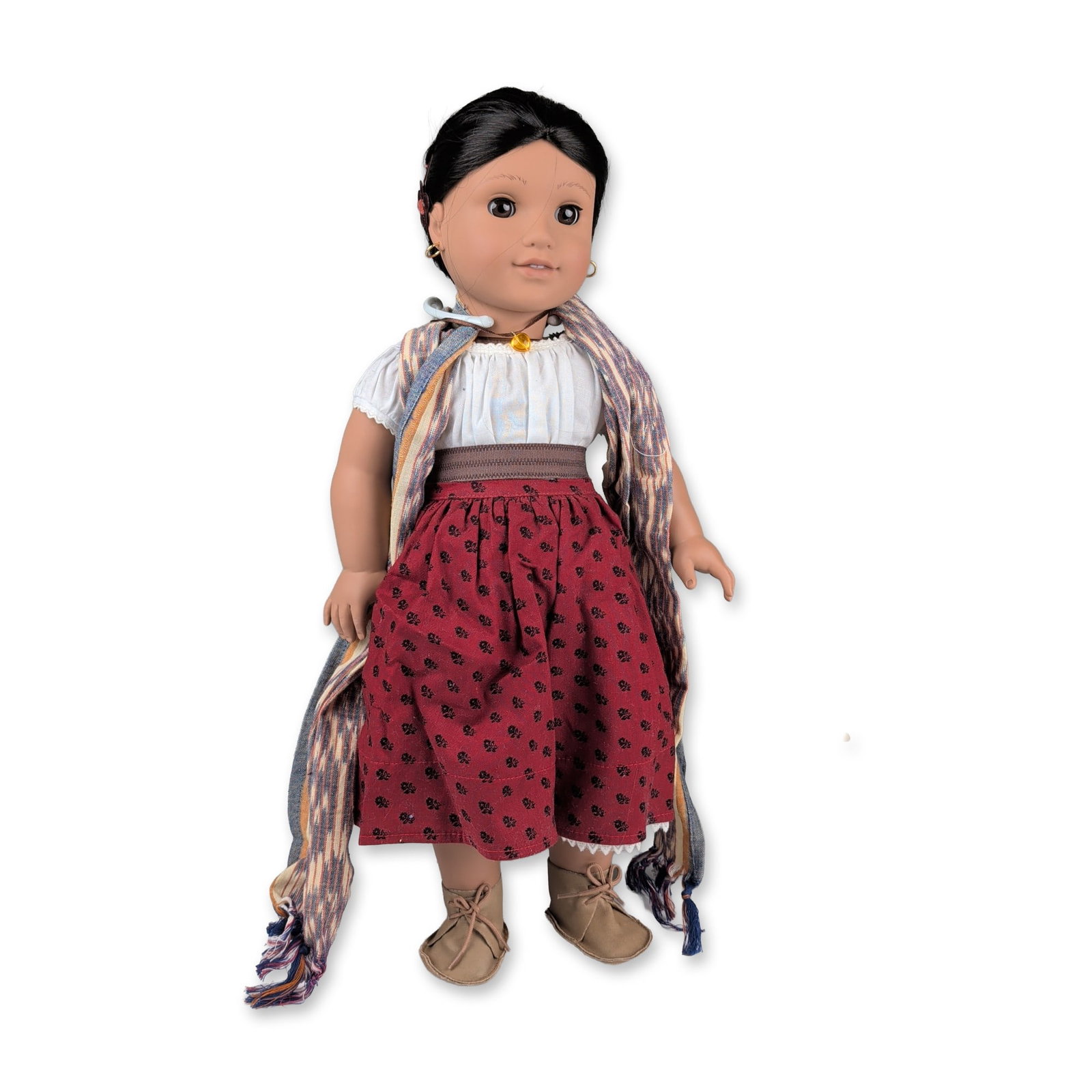 American Girl Josefina Doll and Goat: American Girl Josefina Montoya doll featuring a vinyl head and limbs with a soft cloth torso. The doll has dark brown eyes with a sleep mechanism and black hair in an original braid accented with
