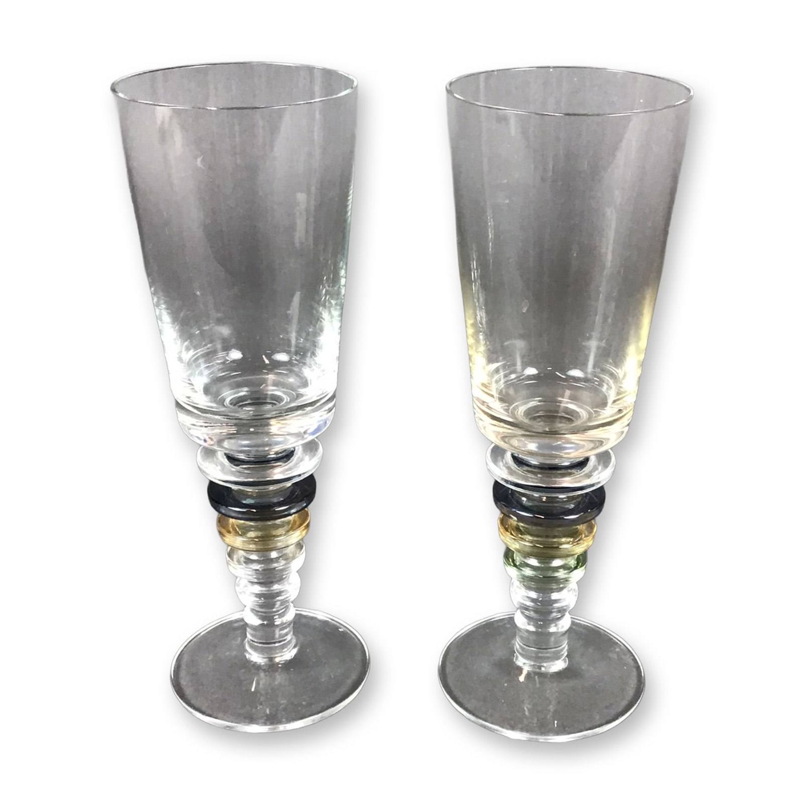 Pair of Block Crystal Carnival Wine Glasses: A pair of wine glasses in the Carnival pattern by Block Crystal. Each glass features a clear, tapered cylindrical bowl set upon a decorative, architectural stacked-ring stem. The stems are composed of