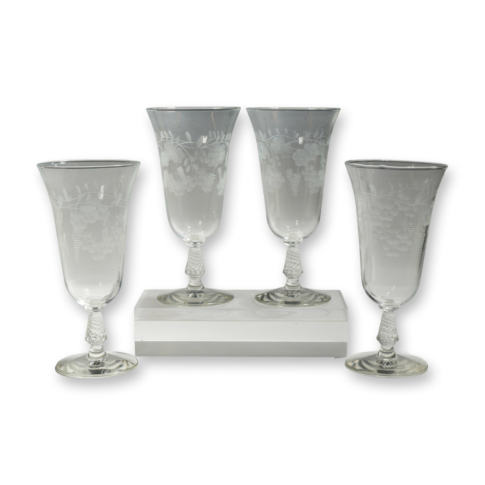 4pc Rock Sharpe Crystal Floral Etched Iced Tea Glasses: Each vessel features a flared, trumpet-shaped bowl decorated with a delicate, continuous wheel-engraved band depicting a trailing vine of hops and stylized floral blossoms. The bowls are supported by