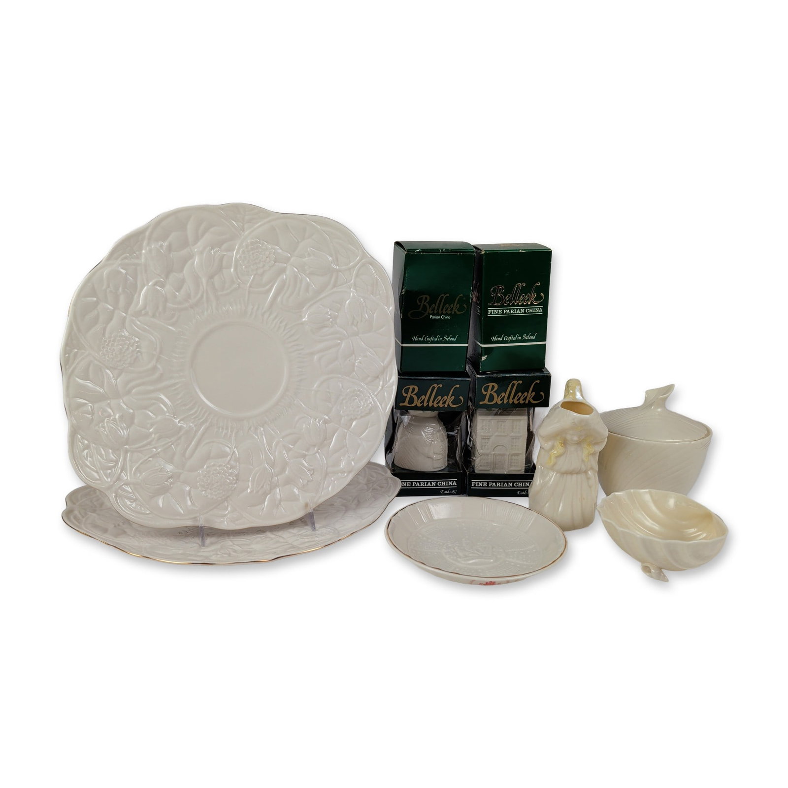 10pc Belleek Fine Parian China Tableware Assortment: This fine collection of Belleek Pottery Irish Parian porcelain showcases a diverse array of functional tableware and decorative items finished in the factory's signature cream-colored iridescent lustr