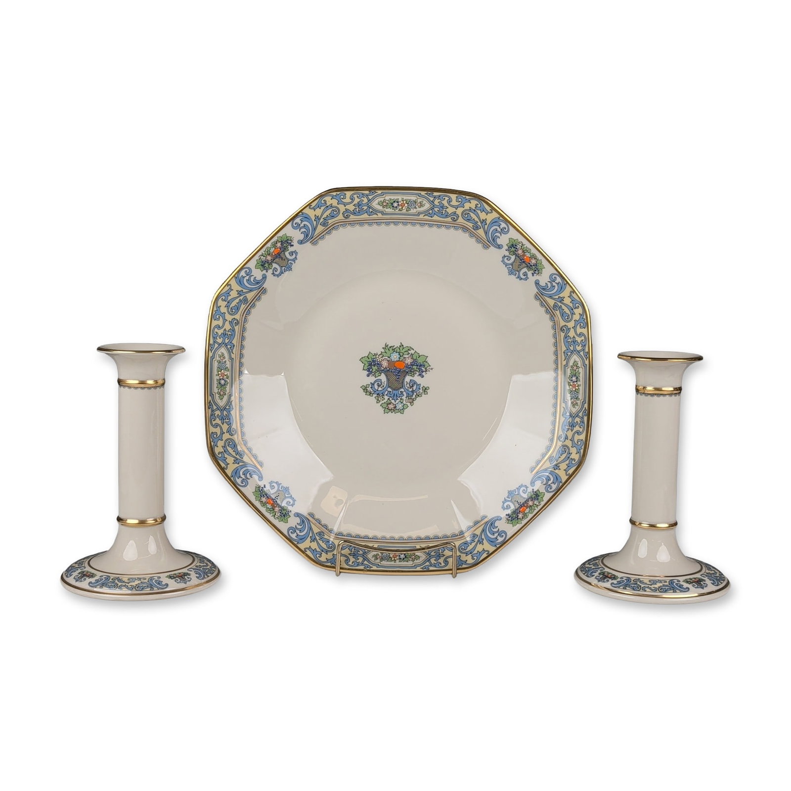 3pc Lenox Autumn Porcelain Server and Pair of Candlesticks: Lenox porcelain tabletop set in the Autumn pattern, produced in the United States. The collection consists of one octagonal serving plate and two column-form candlesticks. Each piece features a