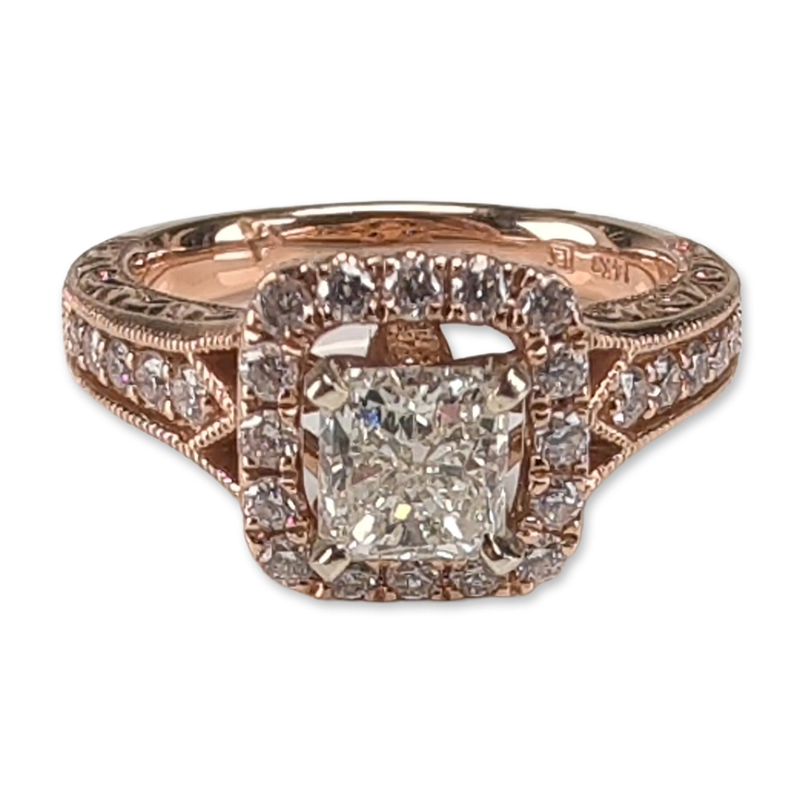 IGI Certified 14K Rose Gold 0.96ct Radiant Cut Diamond Ring: 14k rose gold ring, featuring a central radiant cut diamond with an I color grade and an SI1 clarity, weighting 0.96 carat. The center stone is secured within a four-prong setting and surrounded by a 