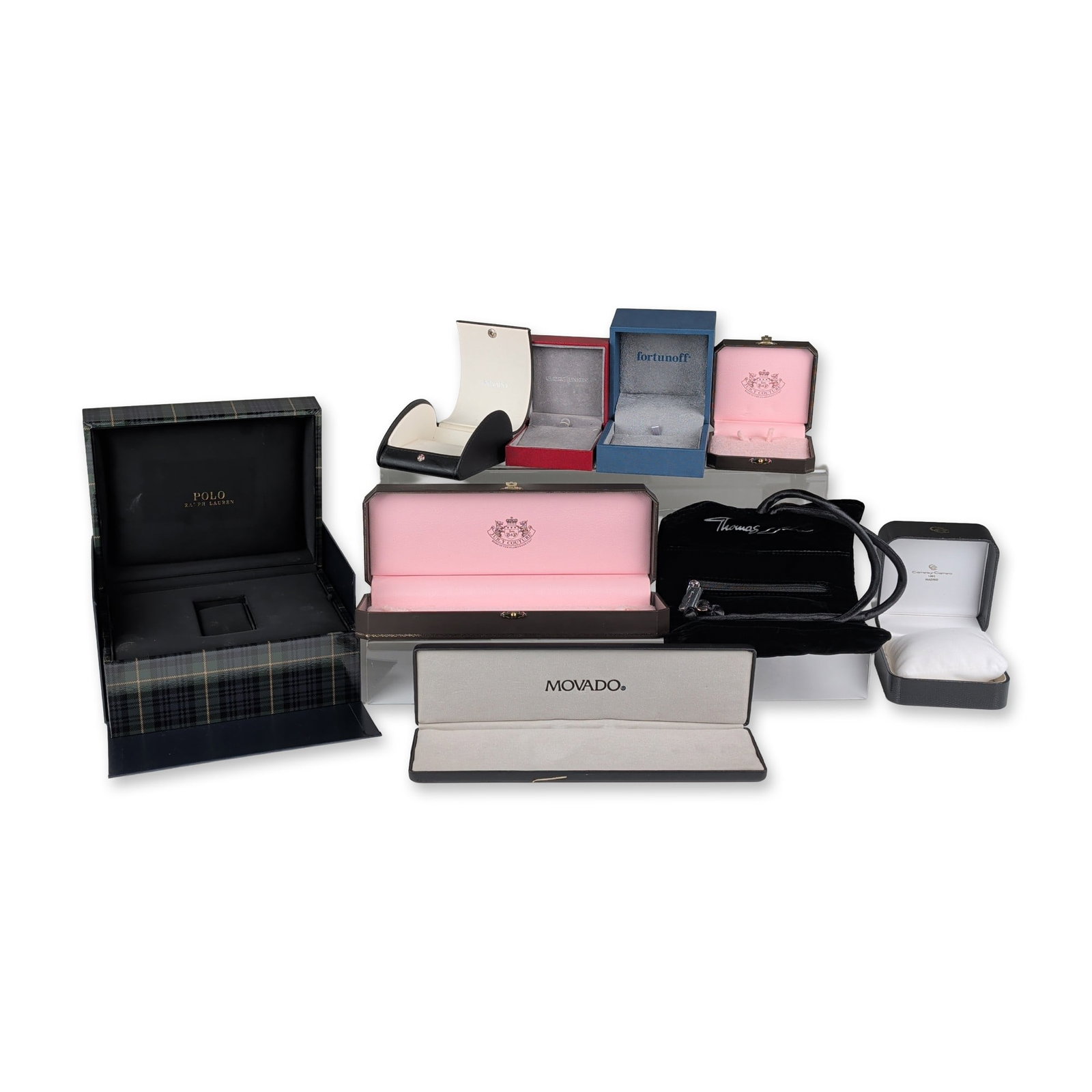 9pc Collection of Branded Jewelry and Watch Presentation Cases: Collection of assorted jewelry and watch presentation packaging including boxes, cases, and a pouch from various brands. Materials include faux leather, paperboard, plastic, velvet, and fabric. The gr