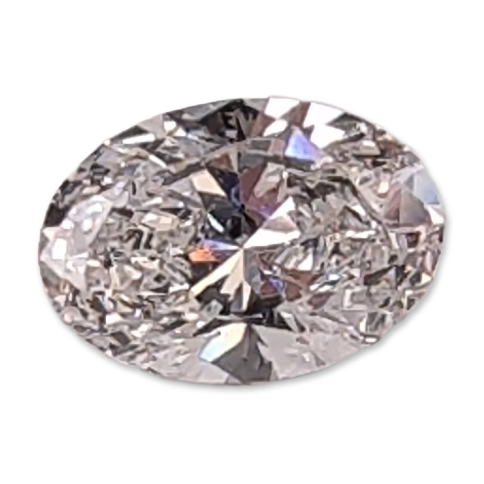 0.94ct Oval Cut Loose Diamond: Lab-grown loose diamond featuring an oval brilliant cut. It is graded D for color and VVS2 for clarity. Weight: 0.94 carat. Dimensions: 5.5mm x 7.6mm