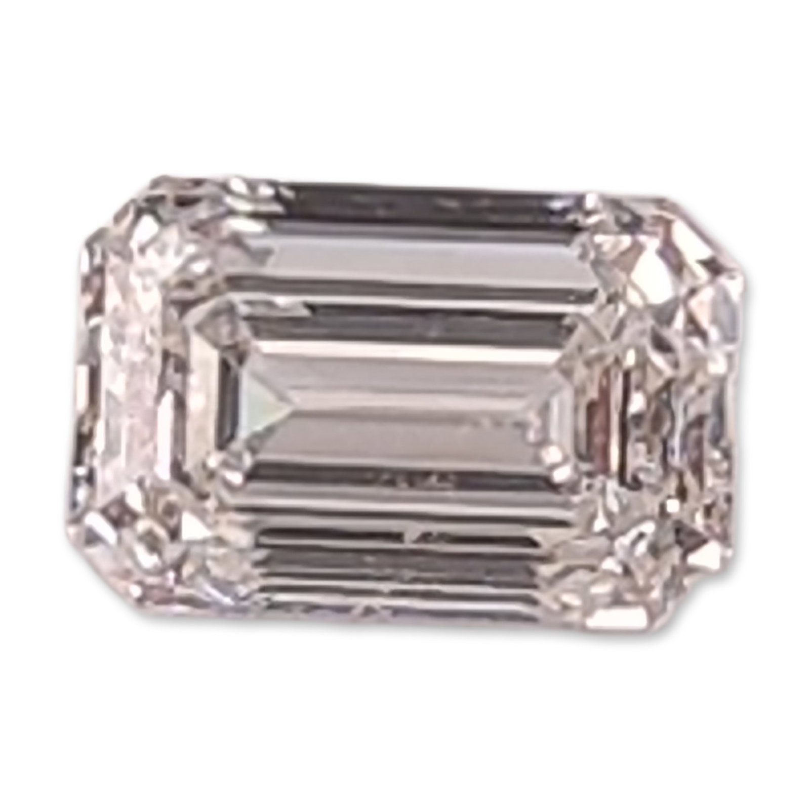 0.91ct Emerald Cut Loose Diamond: Lab-grown emerald cut loose diamond featuring a step-cut design with cropped corners and parallel linear facets. It is graded F for color and VVS2 for clarity. Weight: 0.91 carat. Dimensions: 4.4mm x