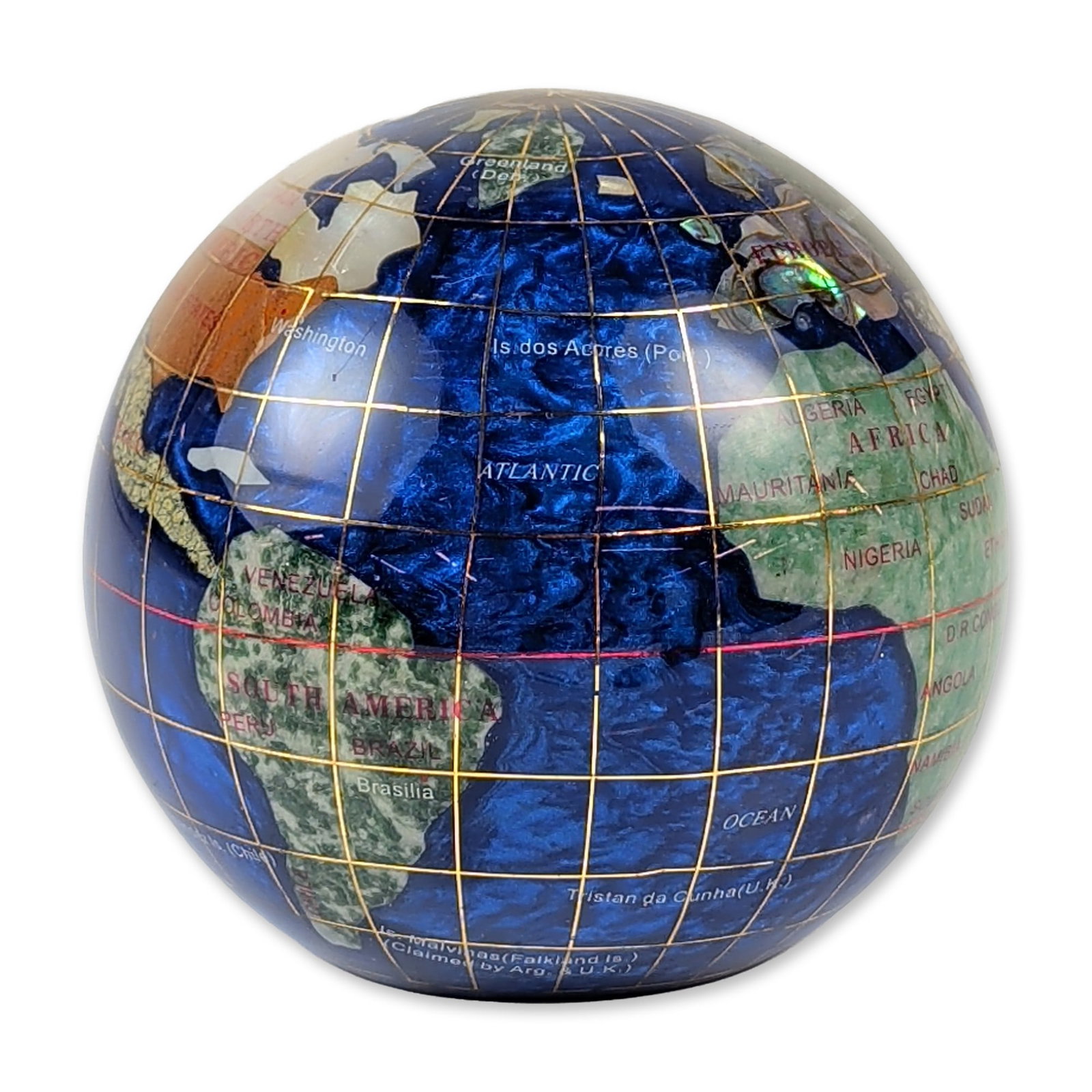 Gemstone Inlay Desktop Globe Paperweight: Desktop globe featuring dark blue lapis-style composite oceans inlaid with multi-colored semi-precious stone landmasses including mother-of-pearl, abalone, jasper, and green aventurine. The surface