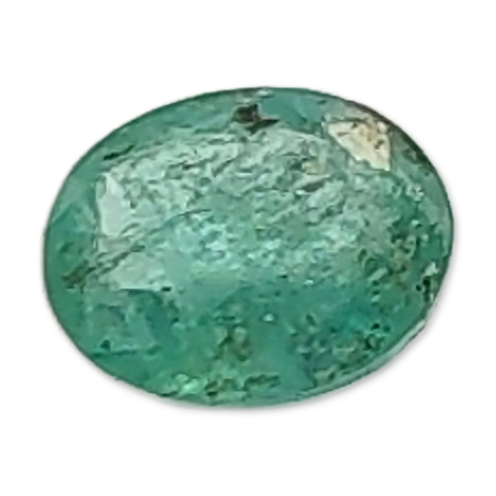 Faceted Round Green Stone: Loose faceted stone, featuring a vibrant, saturated green color. The stone displays characteristic internal inclusions throughout, including feathers and fractures. The cut is round with visible