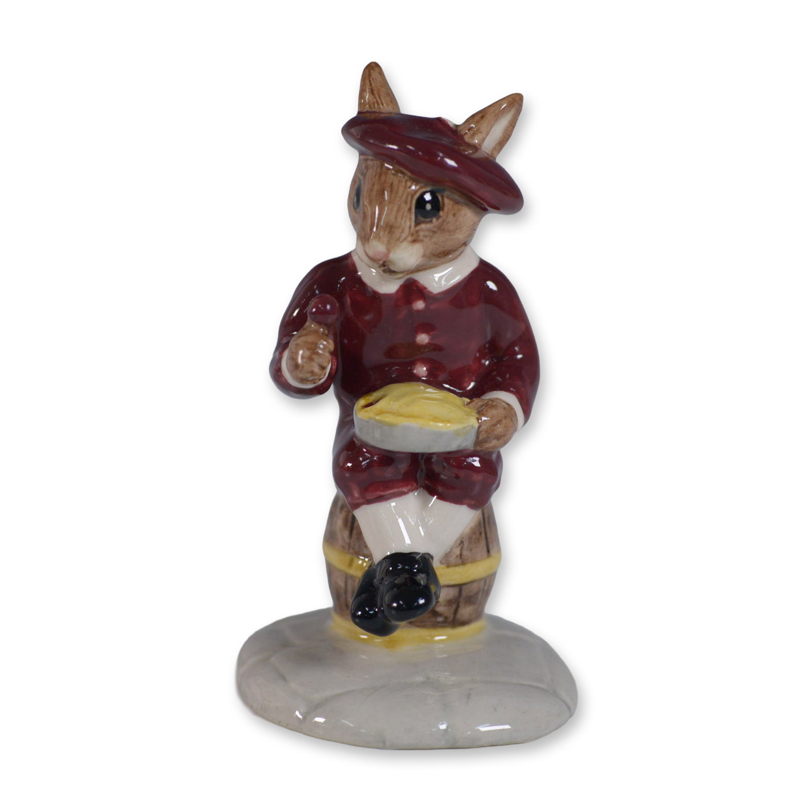 Royal Doulton Bunnykins Figurine, Little Jack Horner DB221: Charming Royal Doulton Bunnykins figurine titled Little Jack Horner, model DB221. This hand-painted porcelain piece features a whimsical rabbit seated on a barrel, dressed in a rich burgundy outfit