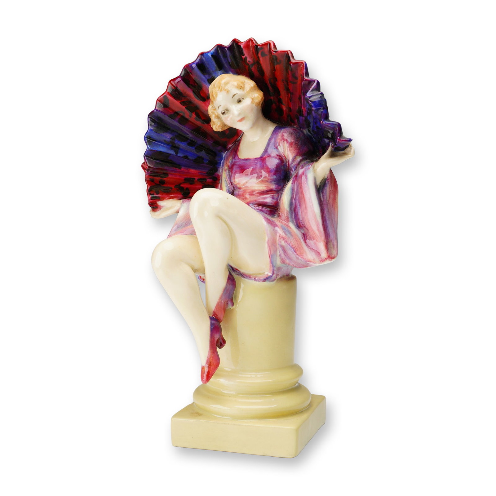 Royal Doulton Figurine, Angela HN1204: A Royal Doulton figurine titled Angela, model HN1204. This hand-painted porcelain figure depicts a seated young woman in a flowing pink and lavender dress, holding an open fan with bold red and purple