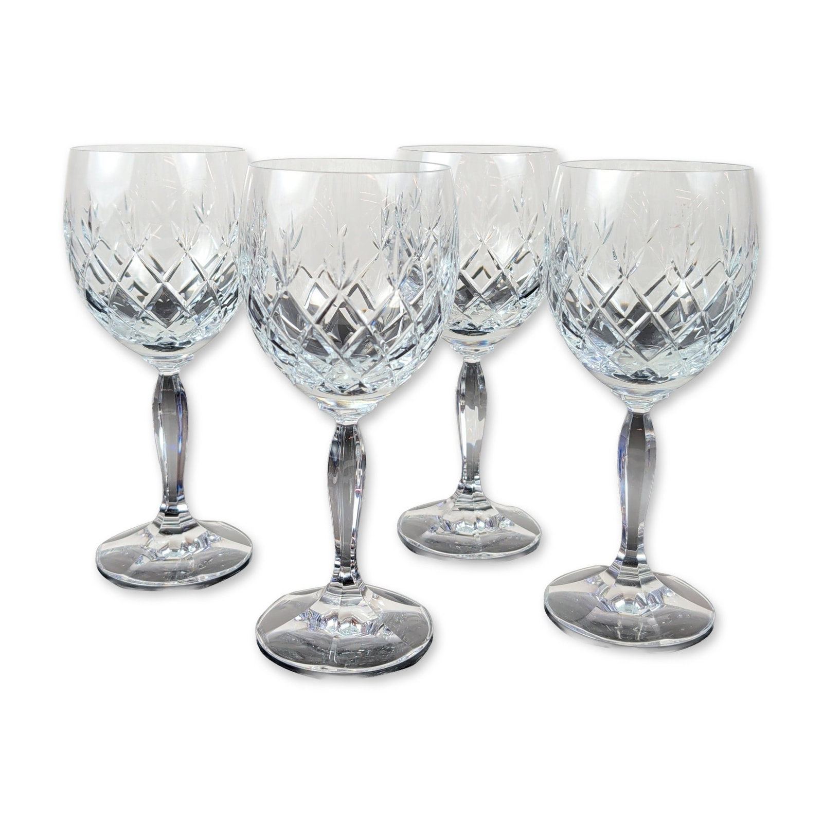 4pc Crystal Wine Glasses: Lead crystal wine glasses featuring hand-cut diamond and vertical wedge cutting on the bowls. Each glass has a multi-faceted hexagonal stem and a circular base with a star-cut pattern. Dimensions: 3.2