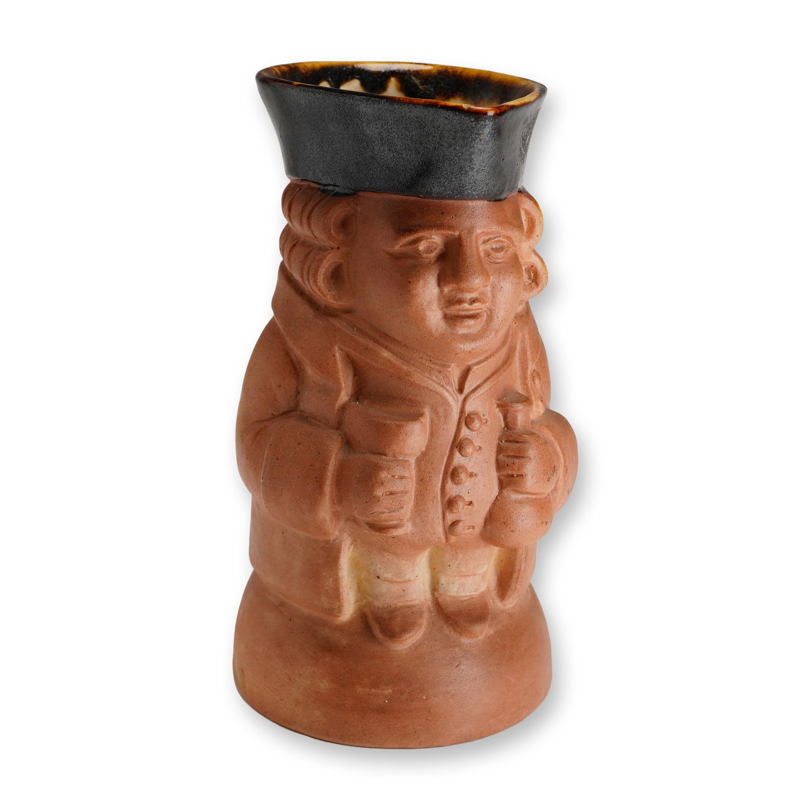 Royal Doulton Lambeth Stoneware Large Standing Toby Jug: A figural jug depicting a standing man, with a smile on his face, holding a beaker and mug of ale. The body is finished in a matte salt-glazed finish, while the hat and upper handle are highlighted
