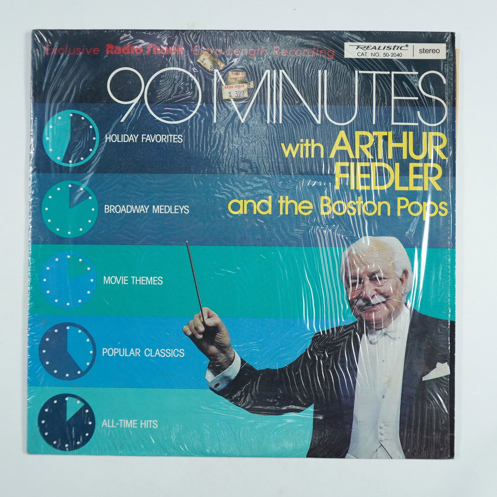 90 Minutes With Arthur Fiedler And The Boston Pops Vintage Vinyl Record: A presentation of 90 Minutes With Arthur Fiedler And The Boston Pops Vintage Vinyl Record, emphasizing the performer, label, genre, and vintage media appeal. Presented by Radio Shack and Realistic Ste