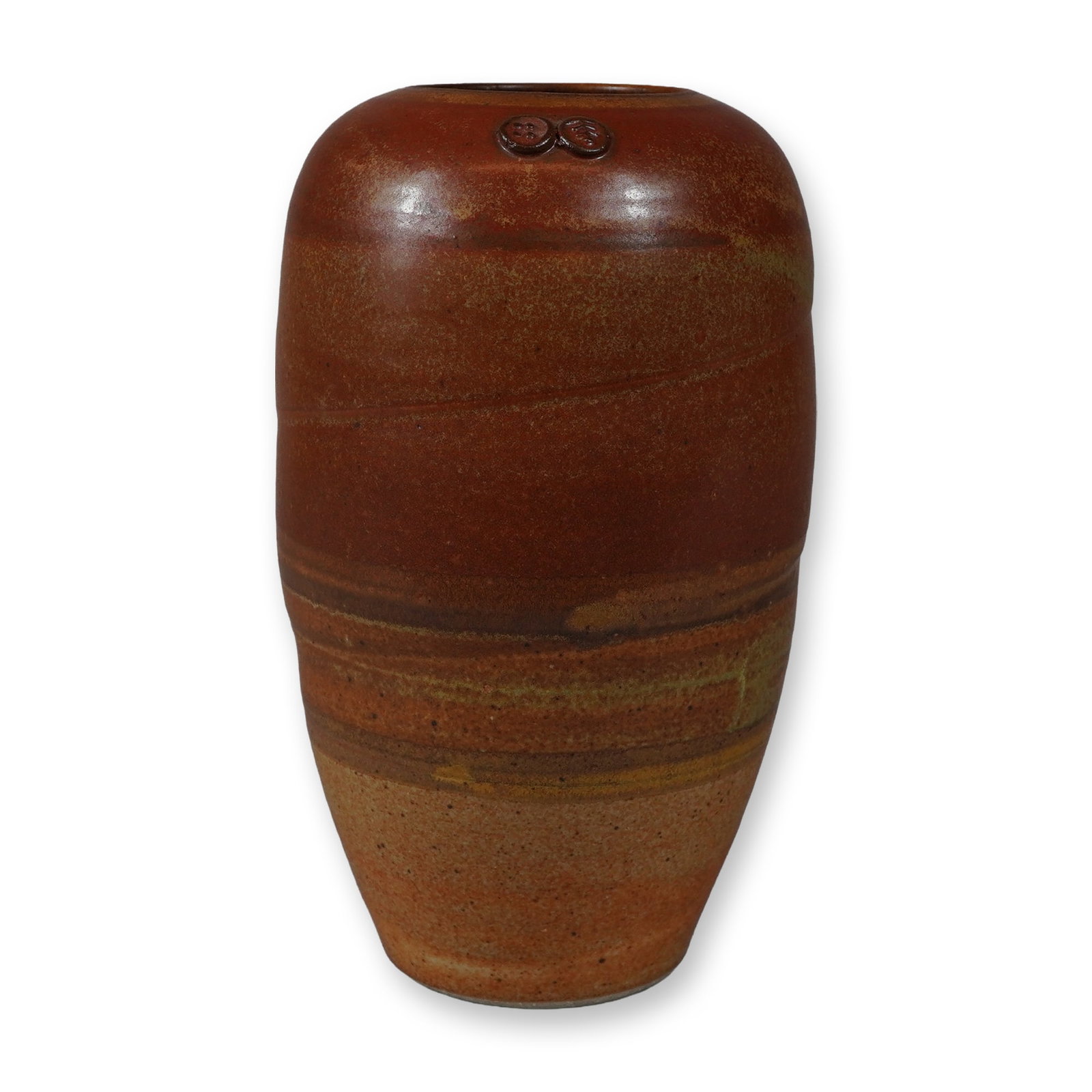 Joe Frank McKee Studio Pottery Stoneware Vase: This studio pottery stoneware vase is identified as the work of American ceramicist Joe Frank McKee, founder of Treehouse Pottery. The vessel features a tall ovoid form with a tapering base and a narr