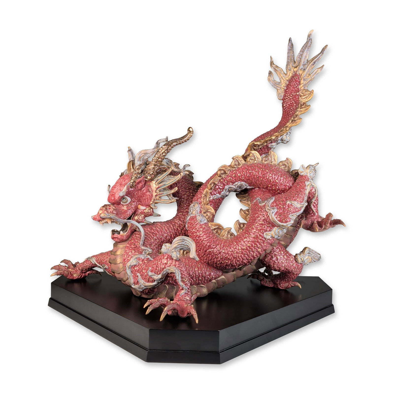 Lladro Porcelain Limited Edition Great Dragon Red Sculpture 01001933 with Base: A large glazed porcelain sculpture of a coiled mythological dragon with textured red scales and hand-applied gold and silver metallic luster highlights to the fins and cloud-like appendages. The figur