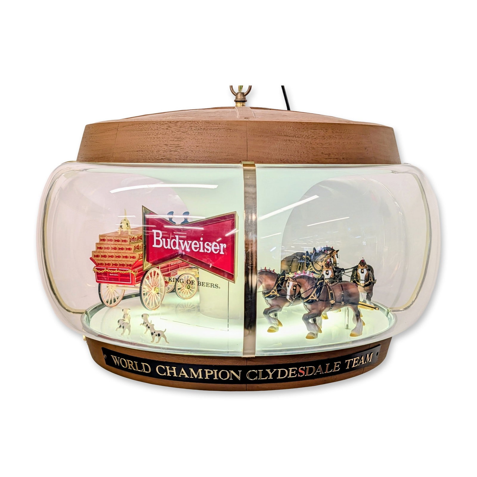 Budweiser Illuminated Motion Carousel Display with World Champion Clydesdale Team: This fully operational Budweiser point-of-sale hanging display doubles as a commanding retro centerpiece the moment it is turned on. Built with a vintage wood-grain finished rim, sleek brass-tone meta