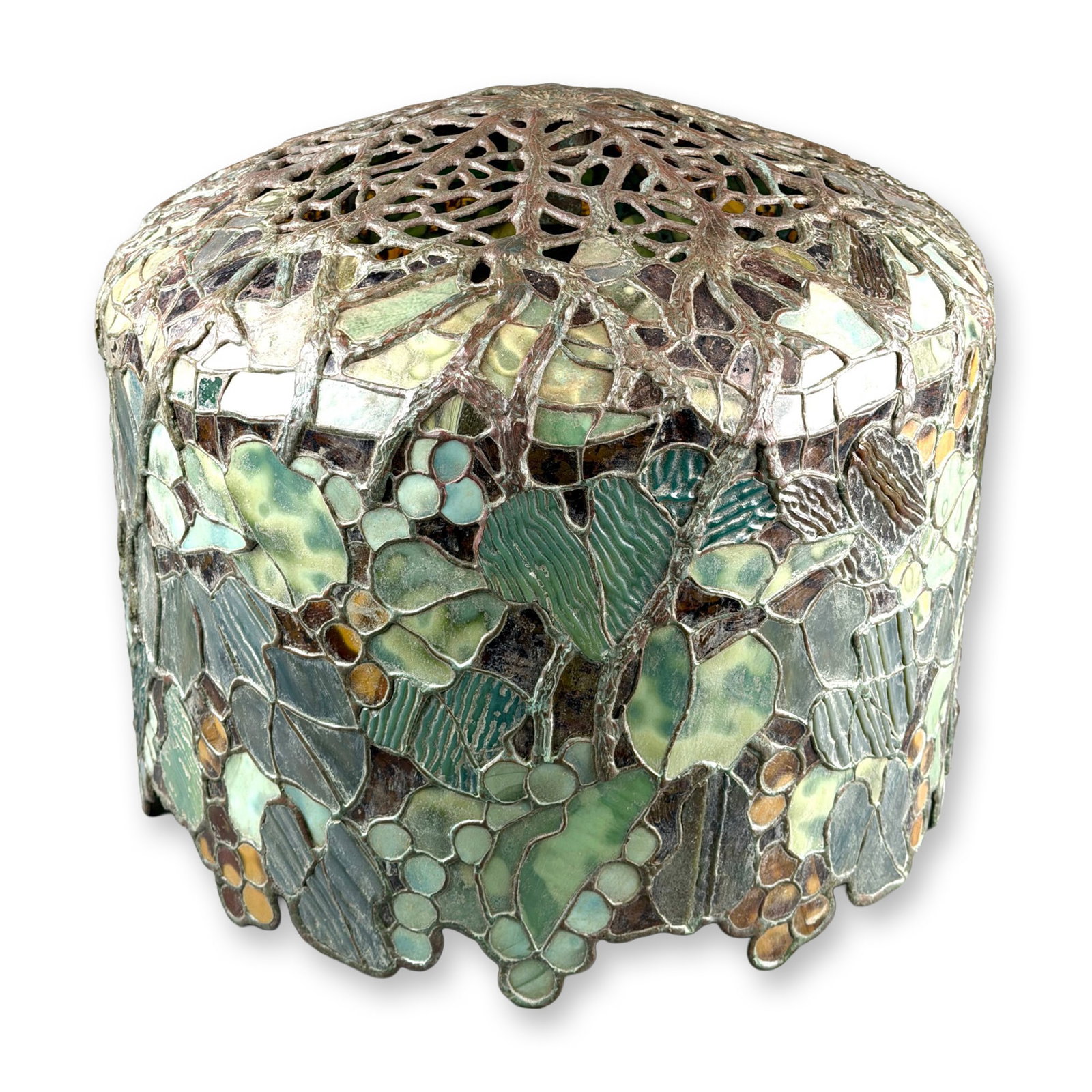 Tiffany Studios New York Grape Leaded Glass and Patinated Bronze Lampshade: Tiffany Studios New York "Grape" lampshade of domed form with a profusion of leaded glass grapes and foliage rendered in mottled, striated, and rippled glass in shades of green, blue, yellow, amber, b
