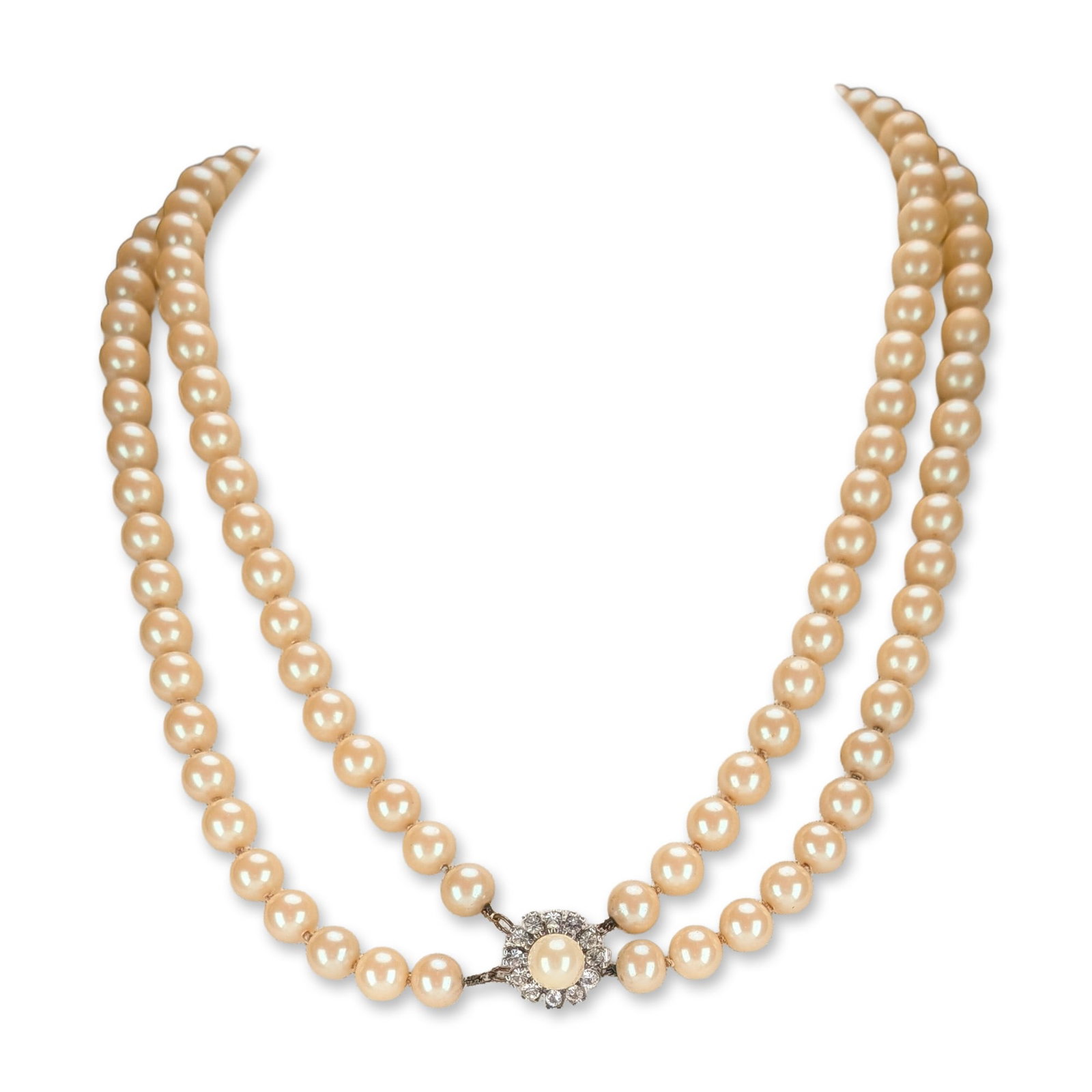 2pc Boreal Spanish Simulated Pearl Necklace and Earrings: Simulated pearl jewelry including a two-strand necklace and stud earrings. The necklace features two strands of creamy simulated pearls secured with a silver-tone floral-motif clasp. The decorative cl