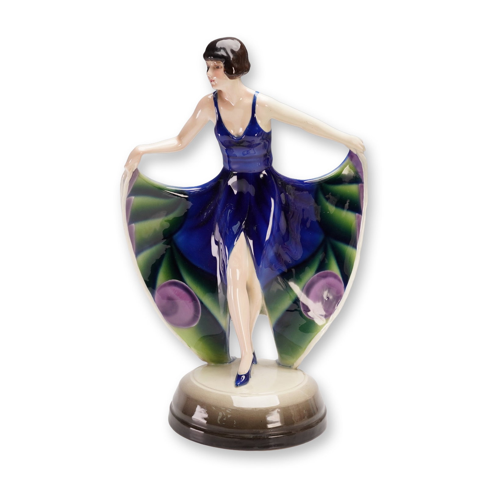 Goldscheider by Josef Lorenzl Woman in Butterfly Dress Figurine: An exquisite Art Deco porcelain figure by Goldscheider Wien, modeled by Josef Lorenzl. The sculpture portrays a poised young woman in a deep cobalt dress, the wide folds of which open like butterfly w