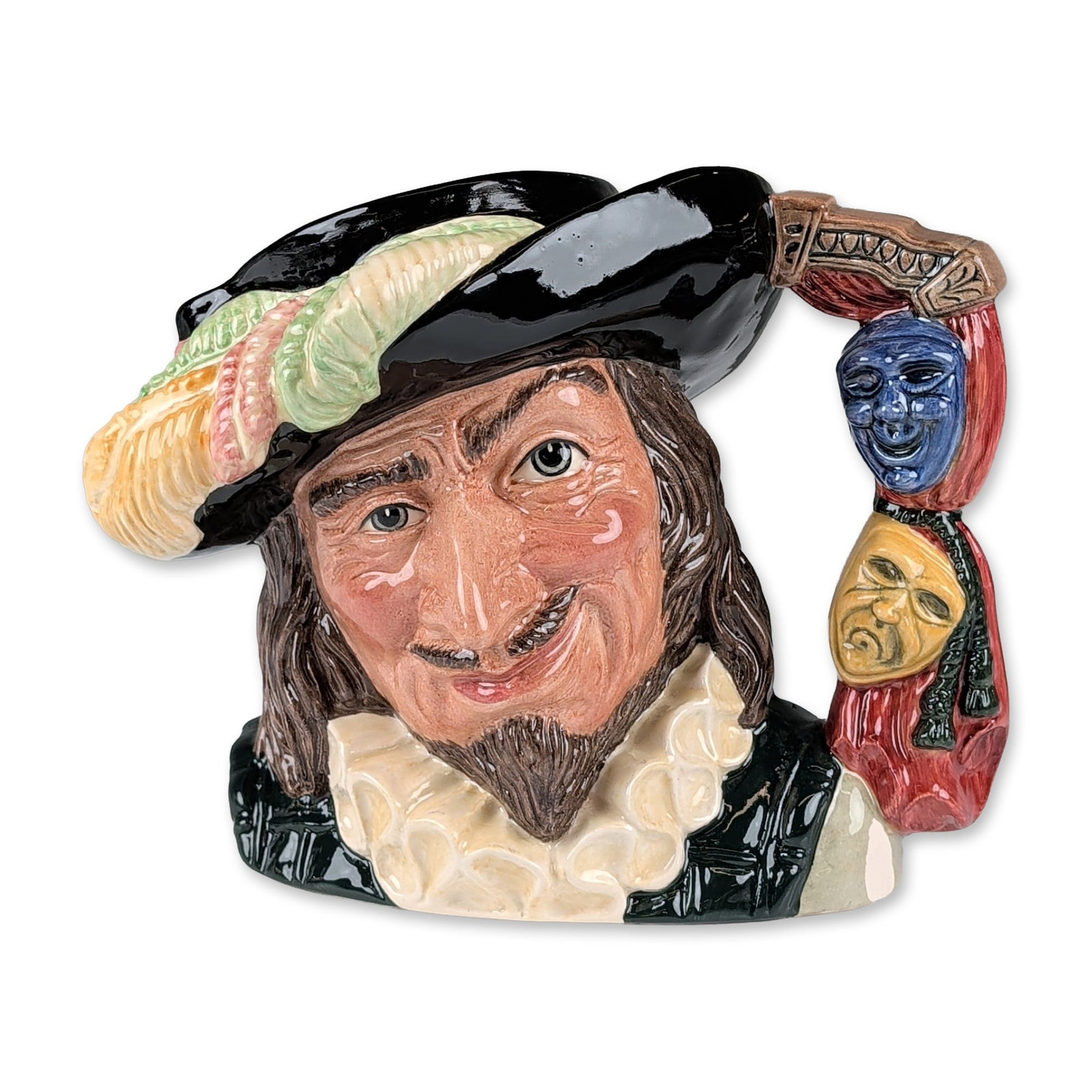 Royal Doulton Prototype Colorway Large Character Jug, Scaramouche D6774: In multi-colored glazed ceramic. The figure is depicted with a brown beard and mustache, wearing a wide-brimmed black hat adorned with green and yellow feathers and a white ruffled collar. The handle 
