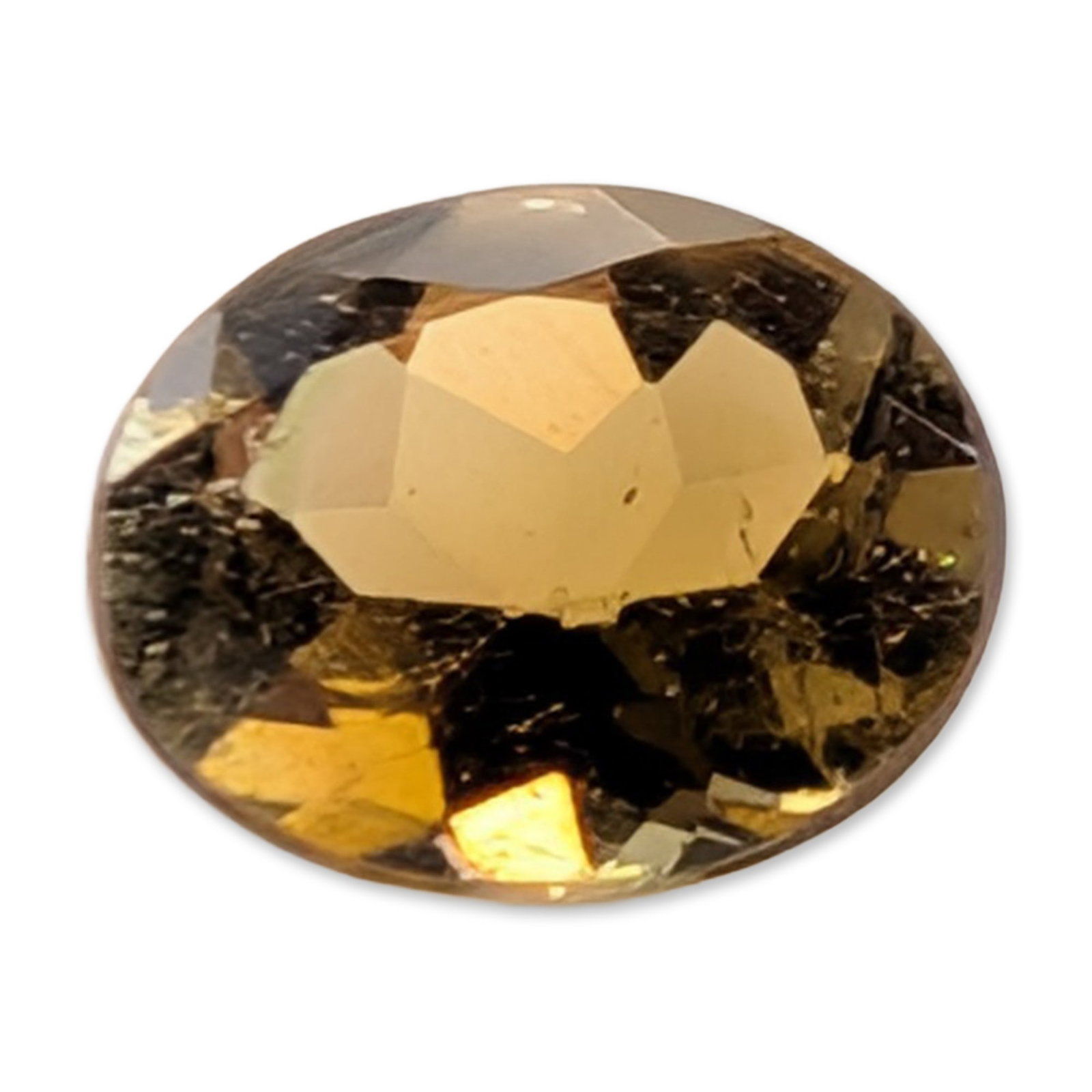 Oval Mixed Cut Brownish Yellow Citrine Gemstone: Loose faceted citrine gemstone. The stone features a translucent brownish-yellow hue fashioned in an oval mixed cut, with areas of darker saturation visible in the pavilion facets. Internal characteri