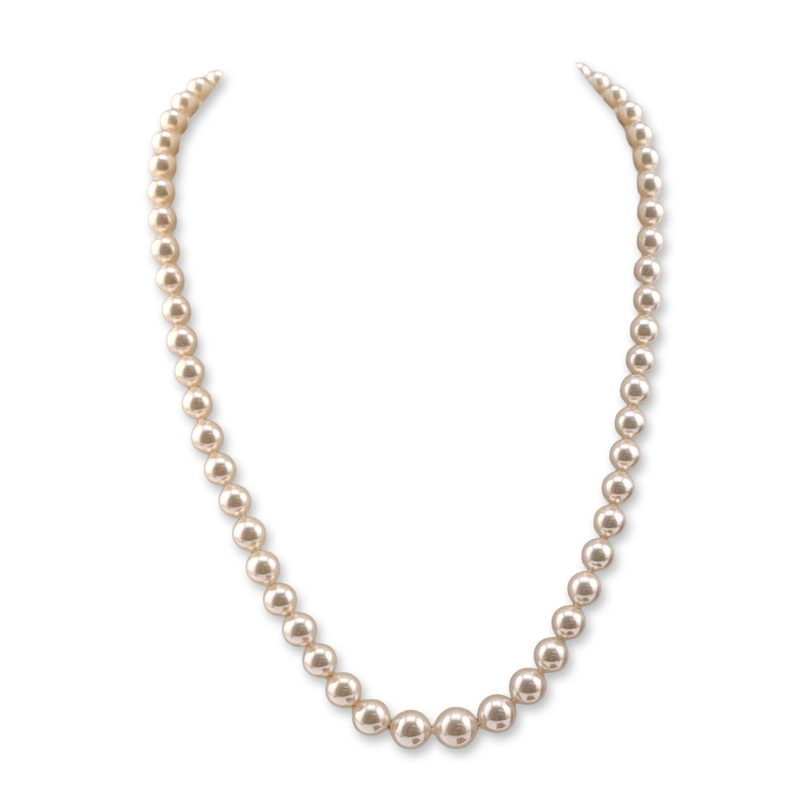 Majorica Single Strand Sterling Silver Pearl Necklace: Majorica single strand necklace featuring individually knotted round simulated pearls in a creamy white body color with pink and green overtones. The necklace is secured with a sterling silver box cla