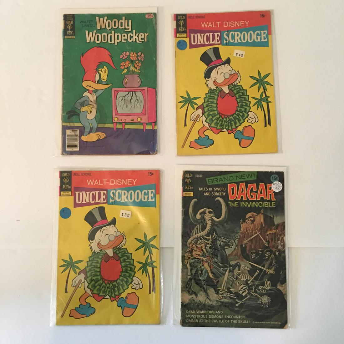 VINTAGE GOLD KEY COMIC BOOK ASSORTED LOT OF (4) WOODY (1 of 1)