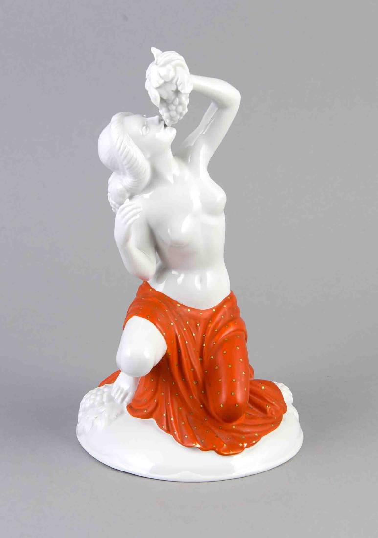 Nude with grapes, Fraureuth, art department, mark: Nude with grapes, Fraureuth, art department, mark 1913-1935, model of Max Daniel Hermann Fritz (1873-1948), in round base signed, crouching female nude with grapes, partky covered with a cloth in char