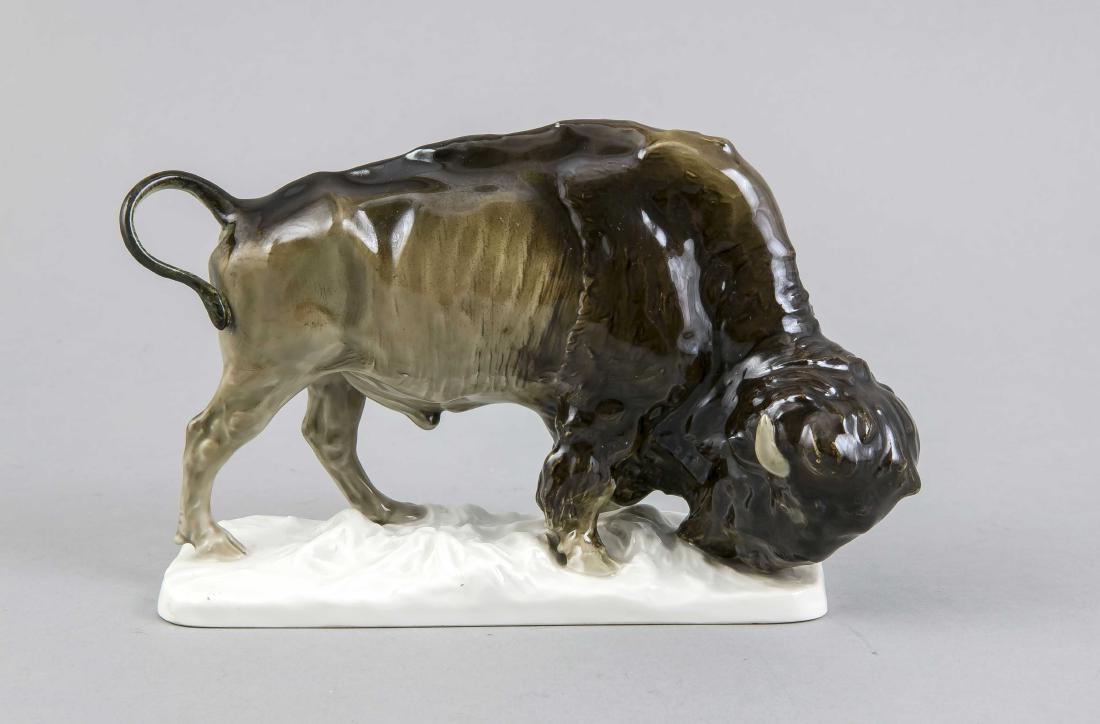 Bison, Meissen,: Bison, Meissen, mark 1924-34, deputy, designed by Erich Hösel in 1904, model no. V 101,naturalistically painted in underglaze colors, rest., L. 21 cm Lit .: Bergmann, Meissen artist figures, model nu