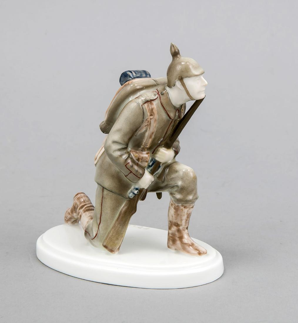 Infantryman, kneeling, Rosenthal, Selb Bavaria, Art: Infantryman, kneeling, Rosenthal, Selb Bavaria, Art Department, 1914, 1st WW, designed byFritz Diller (1875-1945), signed in oval base, Modellnr. K 395, polychrome painted in underglaze colors, h. 13