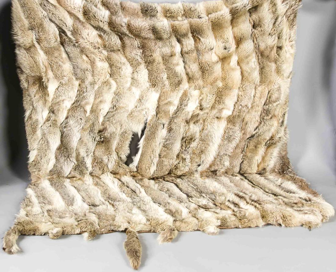 Rabbit fur blanket, on the reverse fabric with Bothé: Rabbit fur blanket, on the reverse fabric with Bothé pattern, slightly dam., 210 x 190 cm