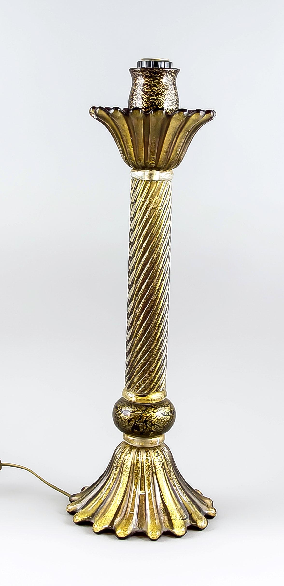 Floor lamp, Italy, 2: Floor lamp, Italy, 2nd half of the 20th cent., Murano, flower-shaped upper end over turned shaft on flared base, clear glass, ruby red overlaid inside, with bursted gold foil, signed, electrified, h. 