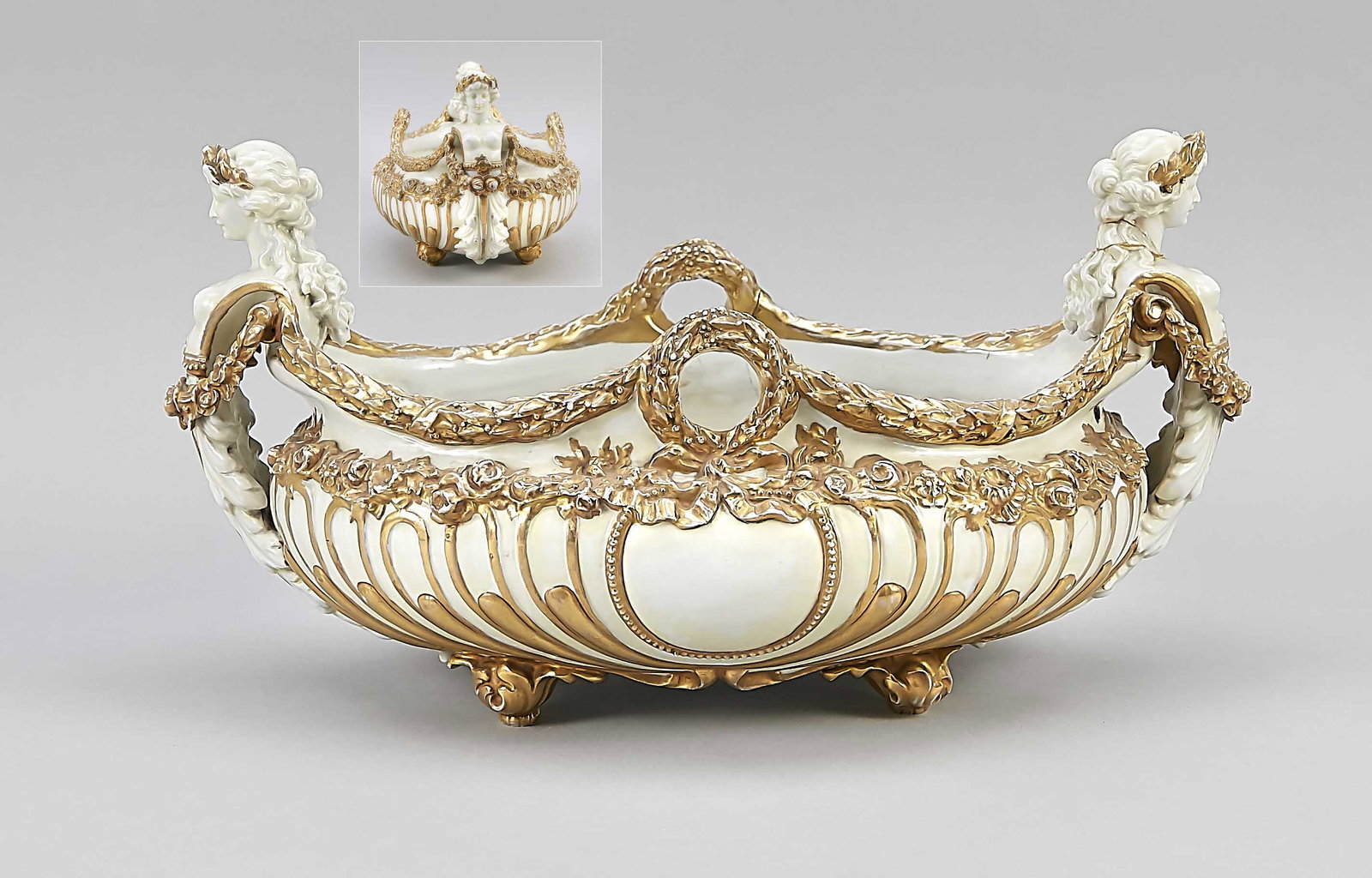 Jardinière, Volkstedt, Th: Jardinière, Volkstedt, Thuringia, beg. 20th century, Baroque style, 2 women's figures as handle on the side, relief and godronised surface, white, splendid ornamental gilding, broken and restored, H.